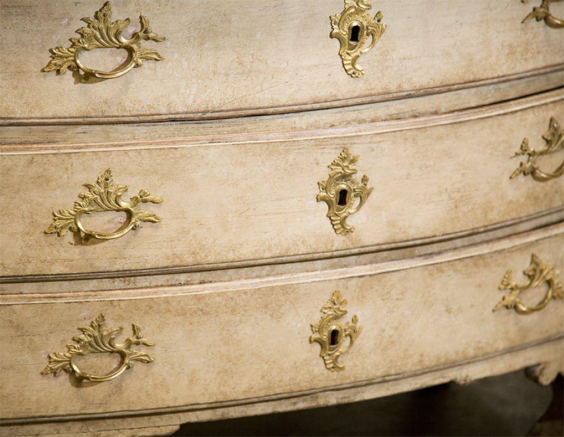 Swedish chest of drawers with original paint and hardware, three drawers, cabriole legs on squared feet. Provenance on top drawer dates piece to 1737.
