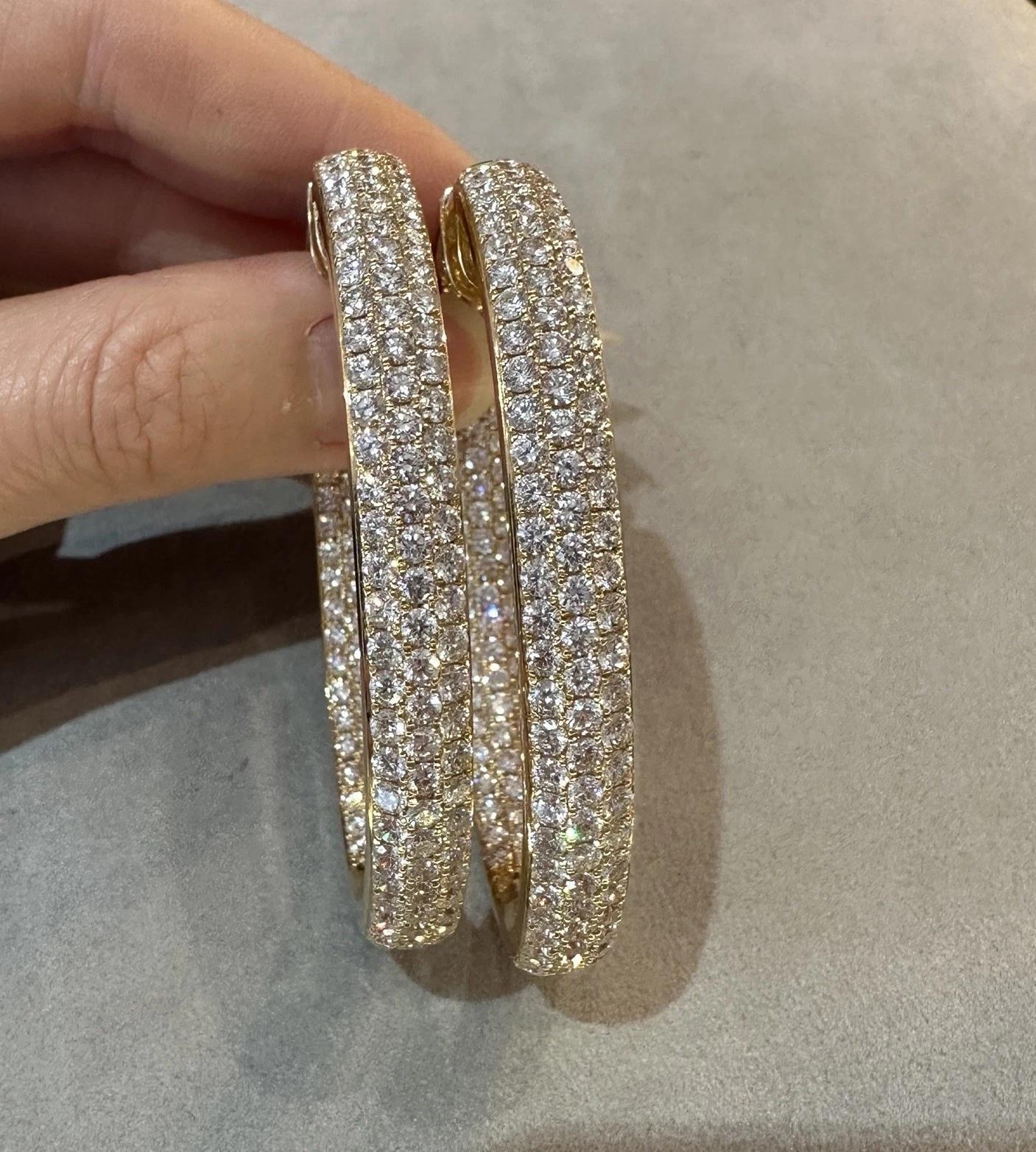 Natural Diamond Oval Pave Hoop Earrings 17.38 cttw in 18k Yellow Gold

Inside Out Pave Diamond Hoop Earrings feature three rows of Pave set Round Brilliant Diamonds set on the inside and outside of the earring, weighing 17.38 carats in total, all