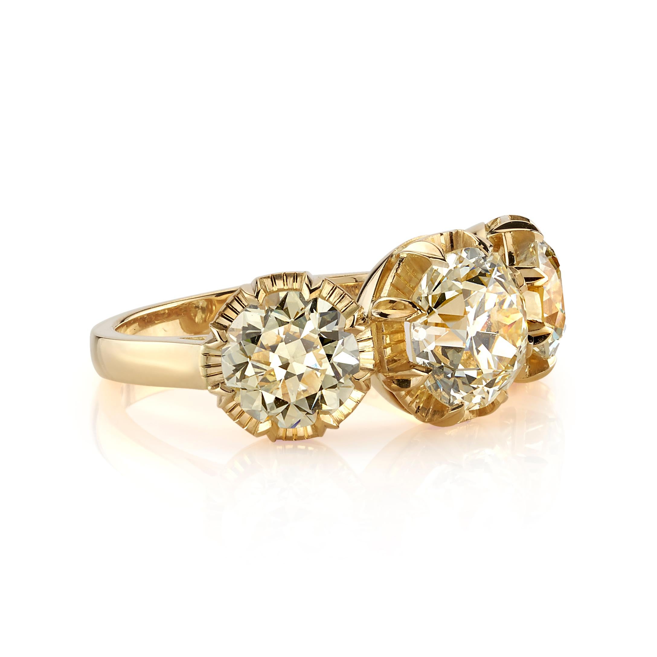1.73ct QR/VVS2 GIA certified old European cut diamond with 2.06ctw accent diamonds set in a handcrafted 18K yellow gold mounting. Ring is currently a size 6 and can be sized to fit. 
