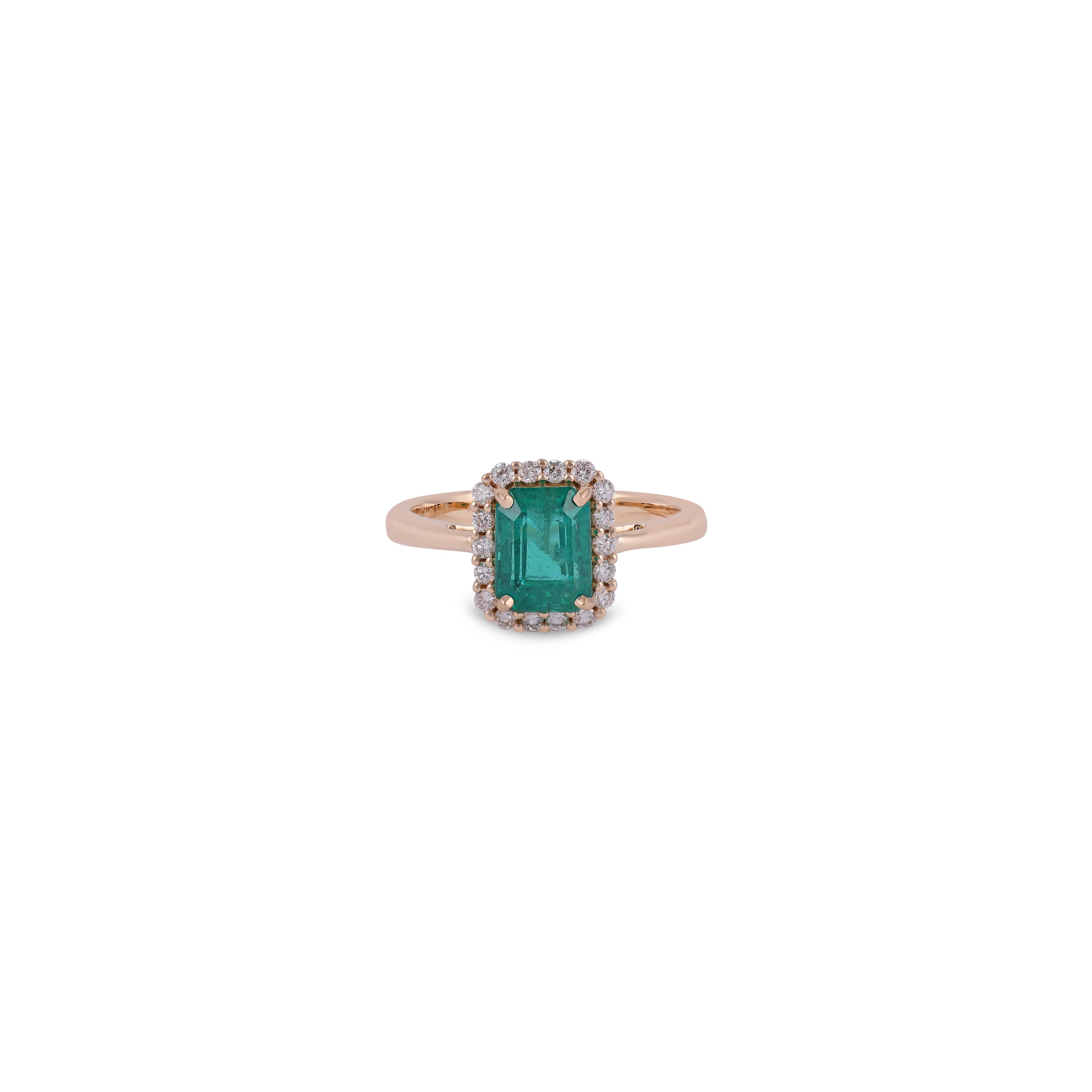 This is an elegant emerald & diamond ring studded in 18k Yellow gold with 1 piece of  Zambian emerald weight 1.74 carat which is surrounded by 18 pieces of round shaped diamonds weight 0.24 carat, this entire ring studded in 18k Yellow gold weight