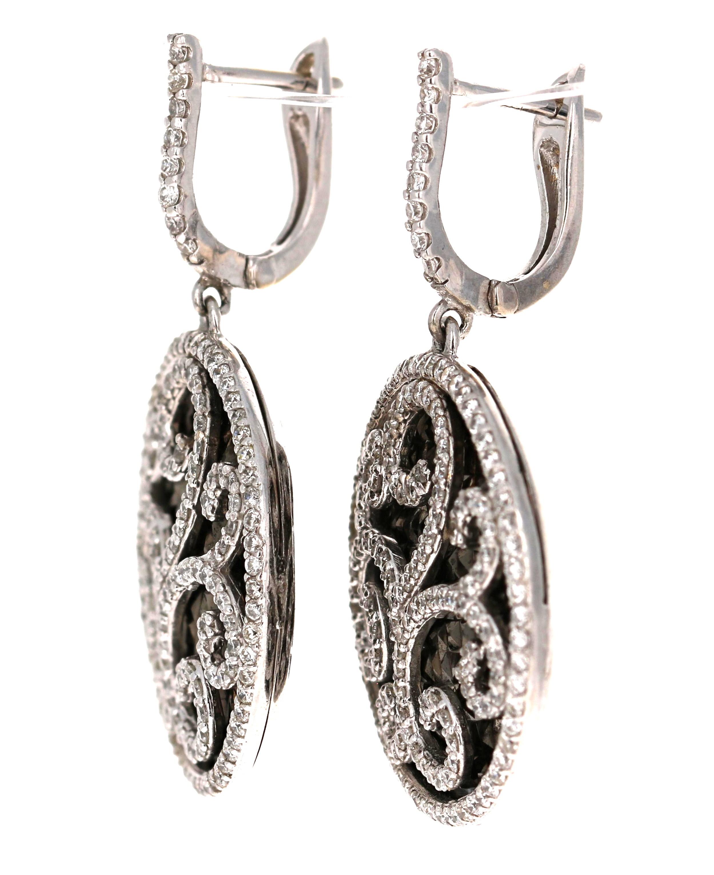 These gorgeous Earrings are a true master piece, the design is unique and a definite show stopper!! A great addition to your accessory collection. 

The Earrings have 329 Round Cut Diamonds that weigh 1.74 Carats (Clarity: SI, Color: F) and is set