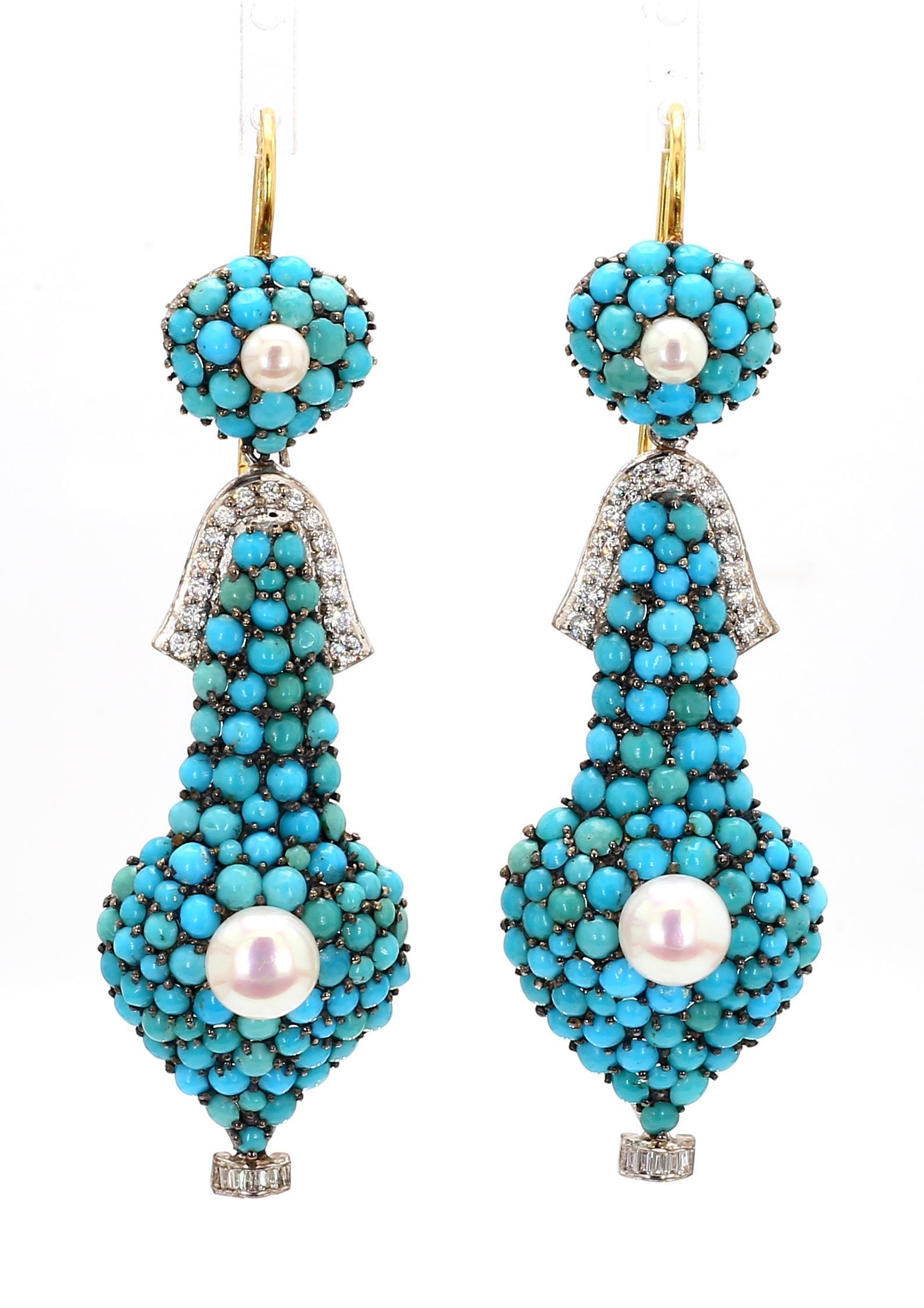 
Step back in time with these exquisite 19th-century inspired drop earrings, meticulously crafted in 18K white gold. The earrings feature a harmonious blend of 1.74 carats of sparkling diamonds, vibrant turquoise stones, and lustrous pearls,