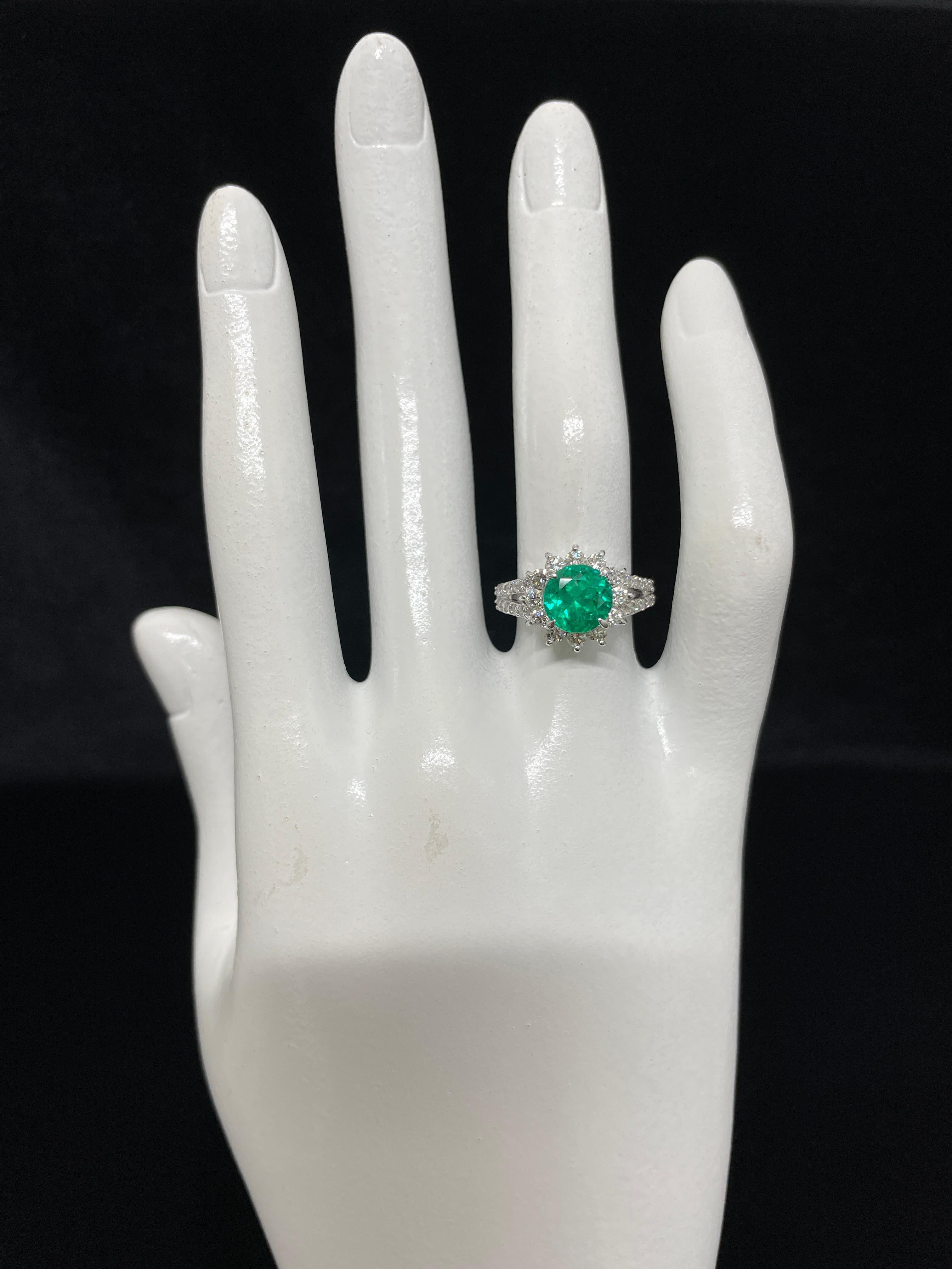 A stunning ring featuring a 1.74 Carat Natural Colombian Emerald and 0.78 Carats of Diamond Accents set in Platinum. People have admired emerald’s green for thousands of years. Emeralds have always been associated with the lushest landscapes and the