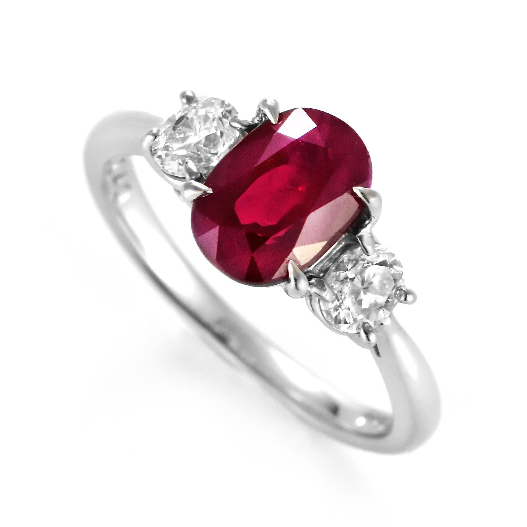 A beautiful Ring made in Platinum featuring a 1.74 Carat Natural Ruby and 0.40 Carat Diamonds. Rubies are referred to as 