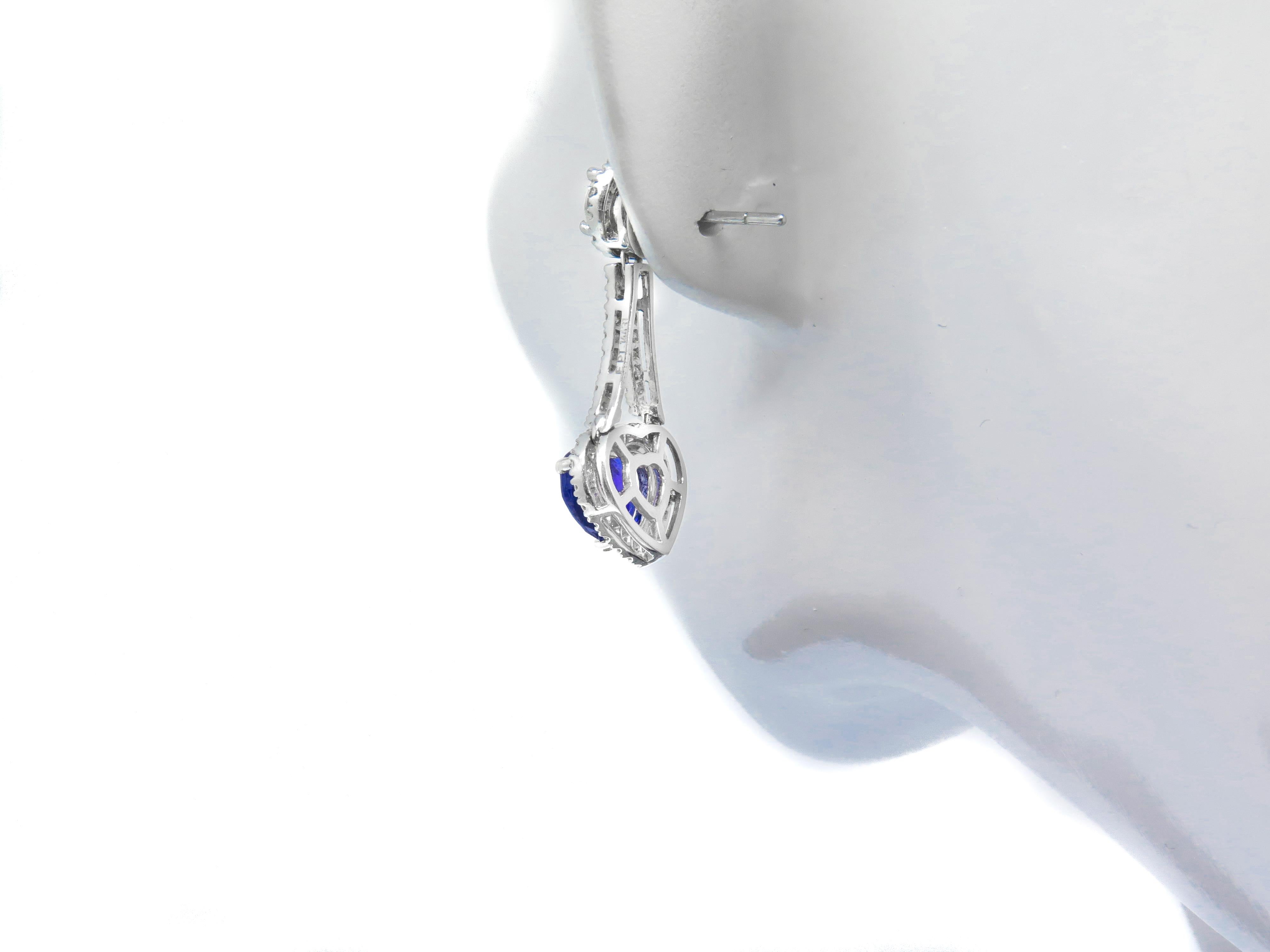 Each sapphire's hue is individual and nuanced; no two are alike. With tones ranging from deep velvety blue to crisp cornflower blue, our blue sapphires are gorgeous specimens of nature's beauty. 

These drop earrings feature two round brilliant cut