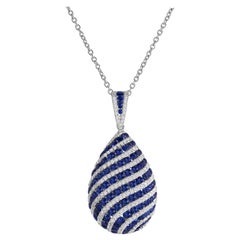 1.74 Carat Sapphire and 0.70 Carat Diamond Swirl Pendant in 18 Karat White Gold
