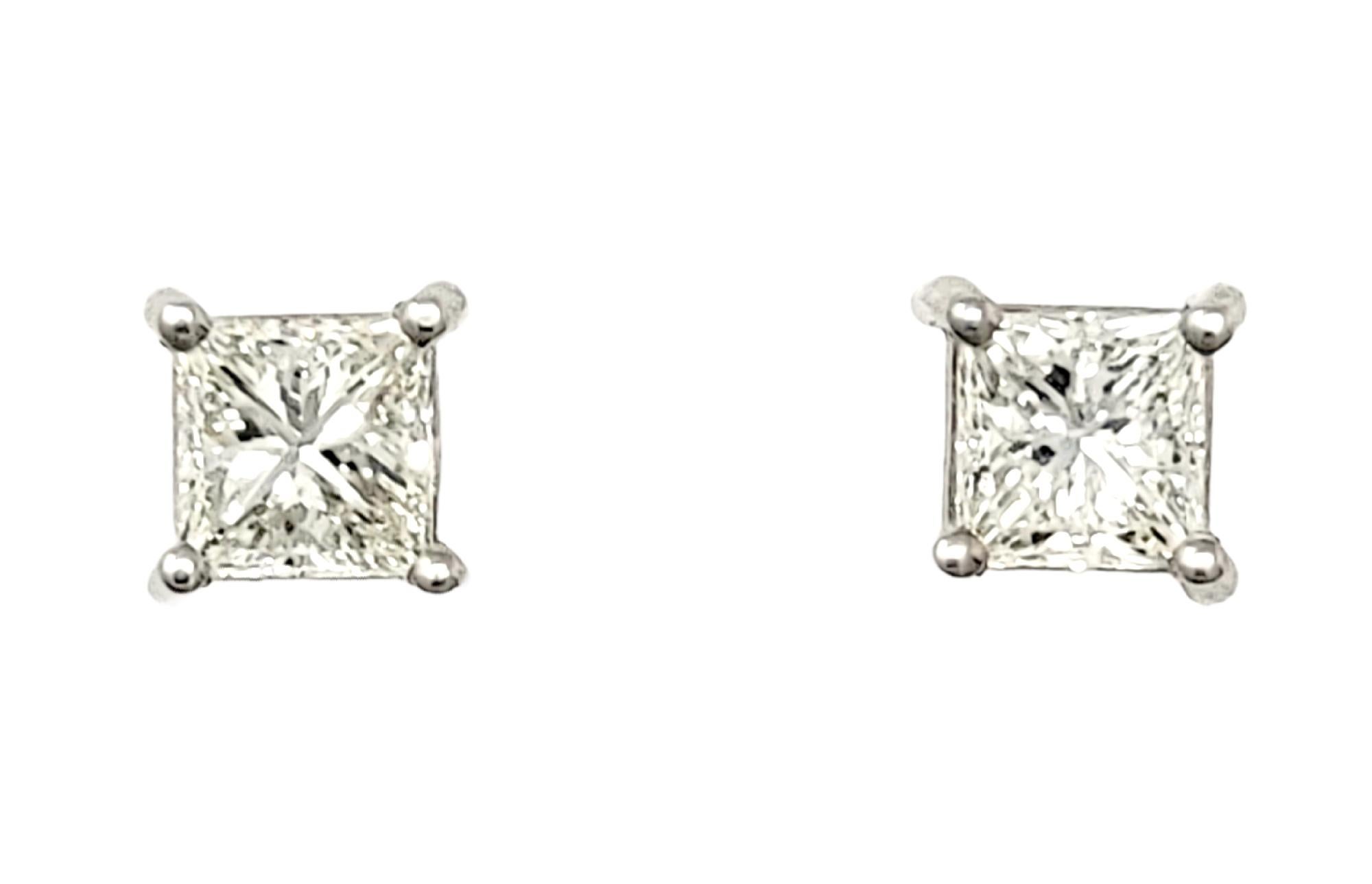These timeless diamond solitaire stud earrings will become your new everyday earrings! These gorgeous square diamond and white gold studs are the epitome of minimalist elegance. They have a simple yet elegant design can be worn with just about