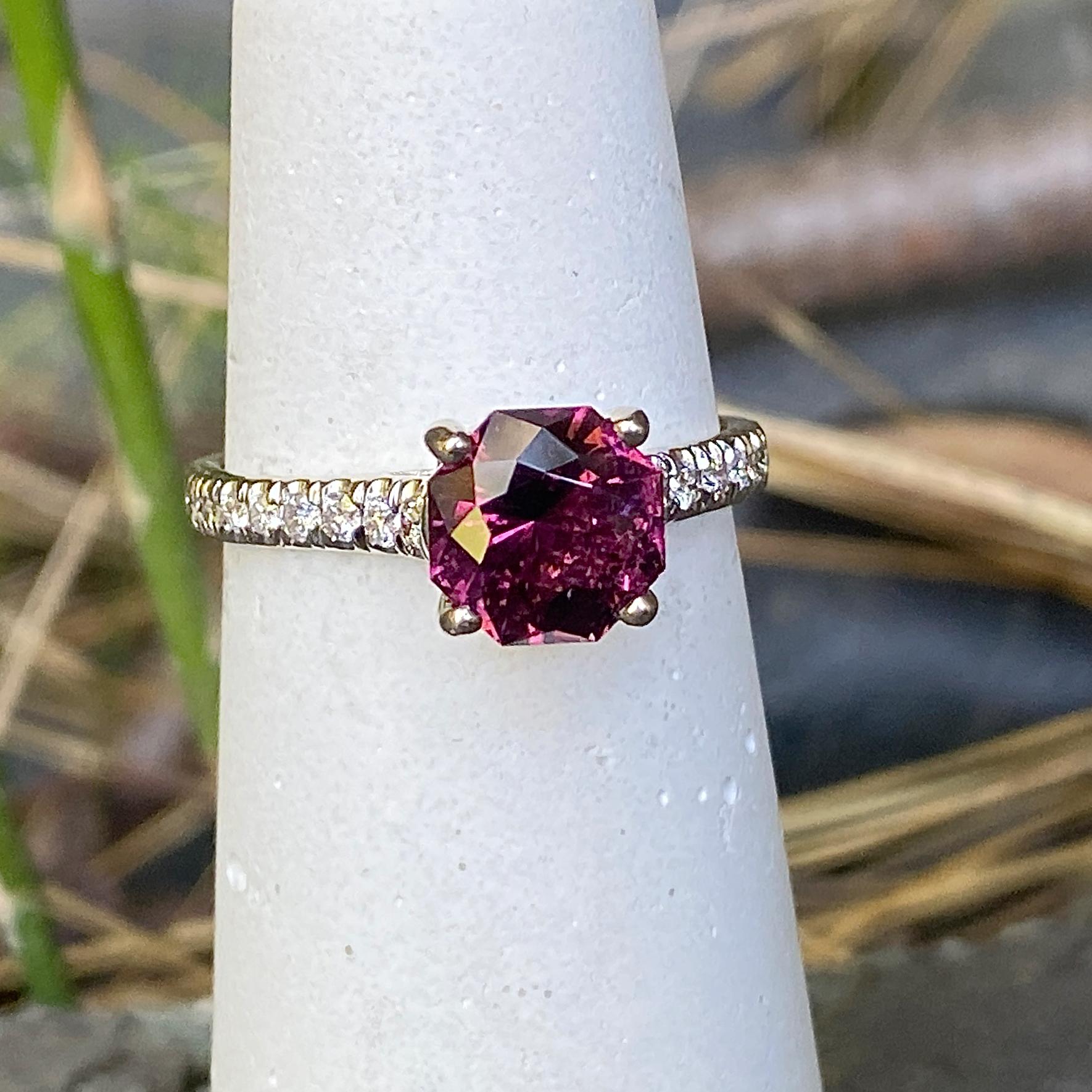 We set this 14 karat white gold engagement ring with a 1.74 carat square tourmaline with cut corners, transforming it into an any-finger-you-want, stackable and versatile pop of that juicy rich color for which tourmalines are so justly prized.

This