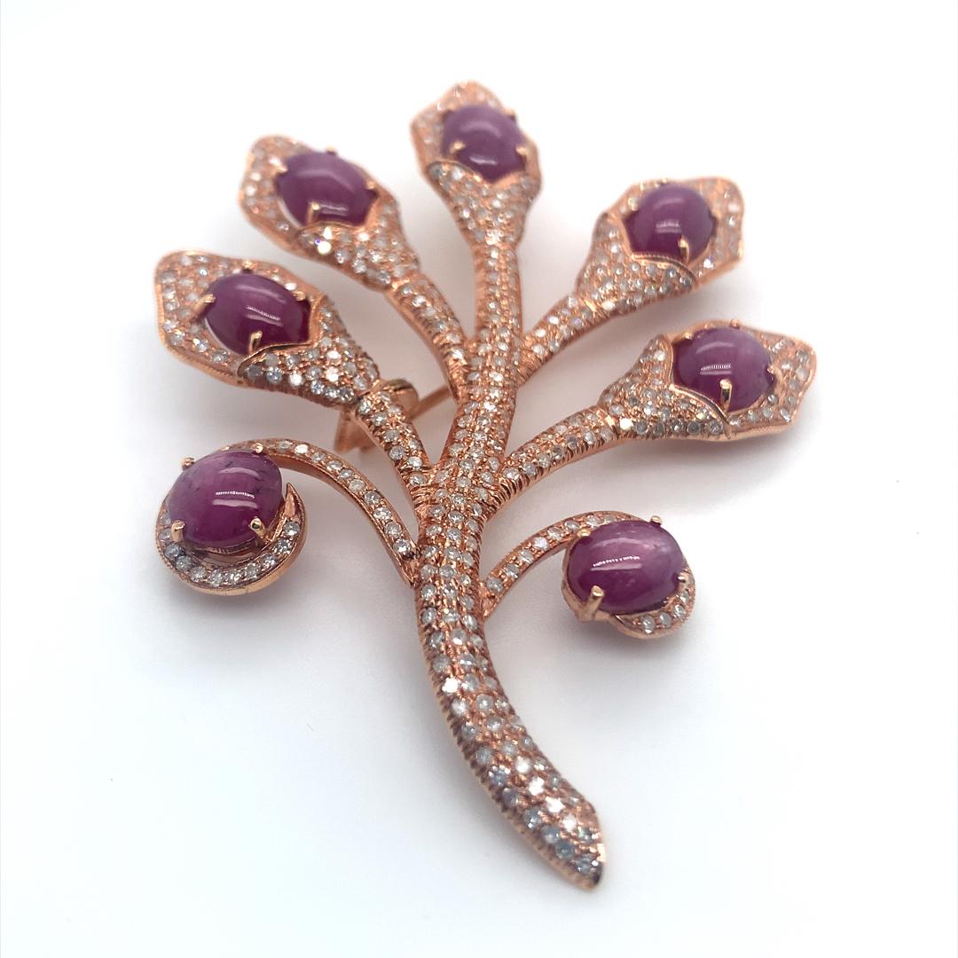 17.40 Carat Ruby and 2.70 Carat Diamond Brooch Pendant set in 18 Kt rose gold. 
Gross Weight: 20.30 Grams
