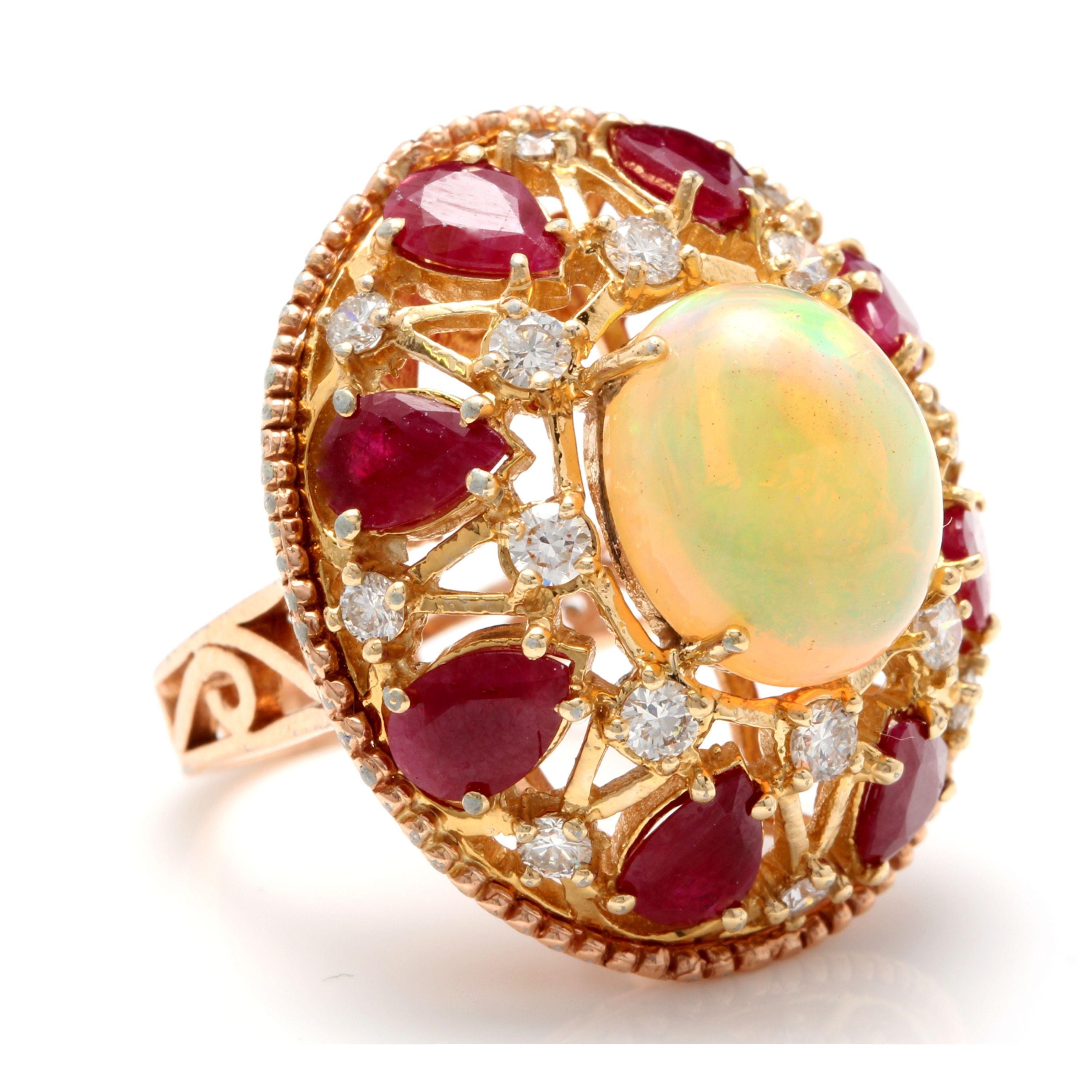 17.40 Carats Natural Impressive Ethiopian Opal, Ruby and Diamond 14K Solid Rose Gold Ring

Total Natural Opal Weight is: Approx. 6.30 Carats

Total Natural Round Diamonds Weight: Approx. 1.10 Carats (color G-H / Clarity SI1-SI2)

Top of the ring