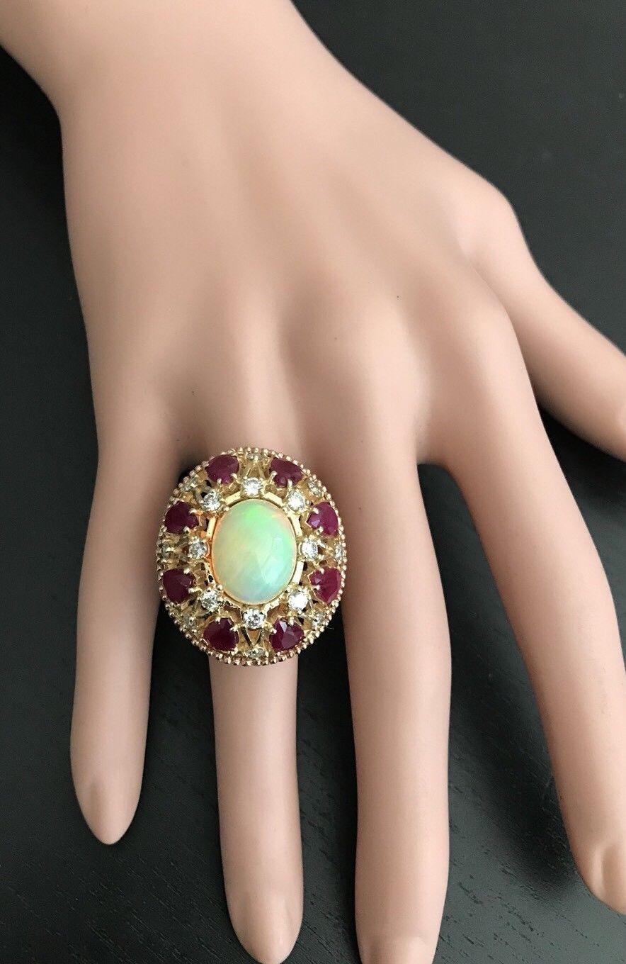Women's 17.40 Carat Natural Ethiopian Opal, Ruby and Diamond 14 Karat Solid Gold Ring For Sale