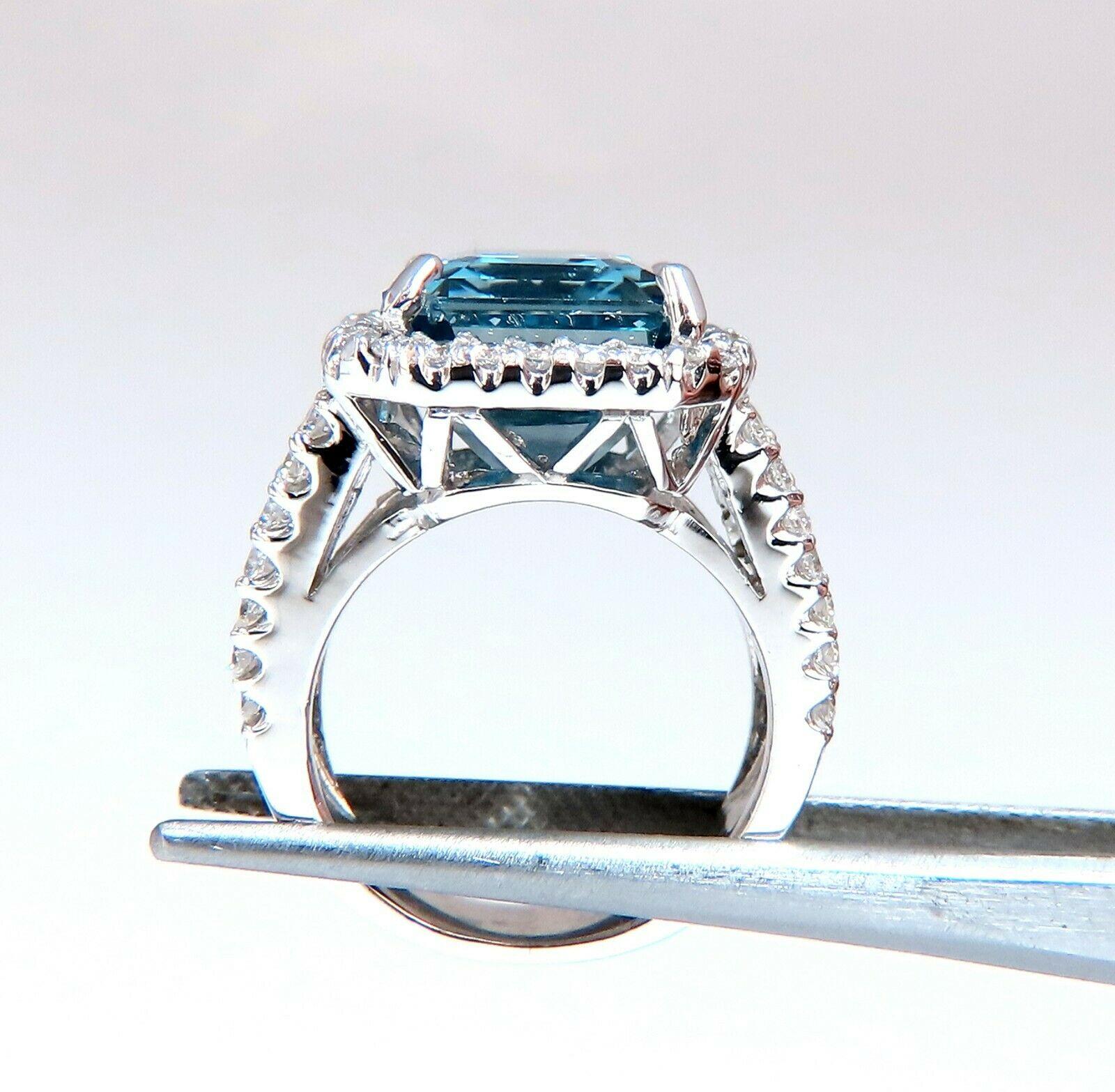 15.00ct. Natural Emerald cut Swiss Blue Topaz Ring 

Topaz: 14 x 11.5mm

Emerald Full cut brilliant 

Transparent and Clean Clarity 

2.40ct. Side natural round white diamonds:

G- Color, Vs-2 clarity.

14kt. White gold

13.5 grams

Ring Current