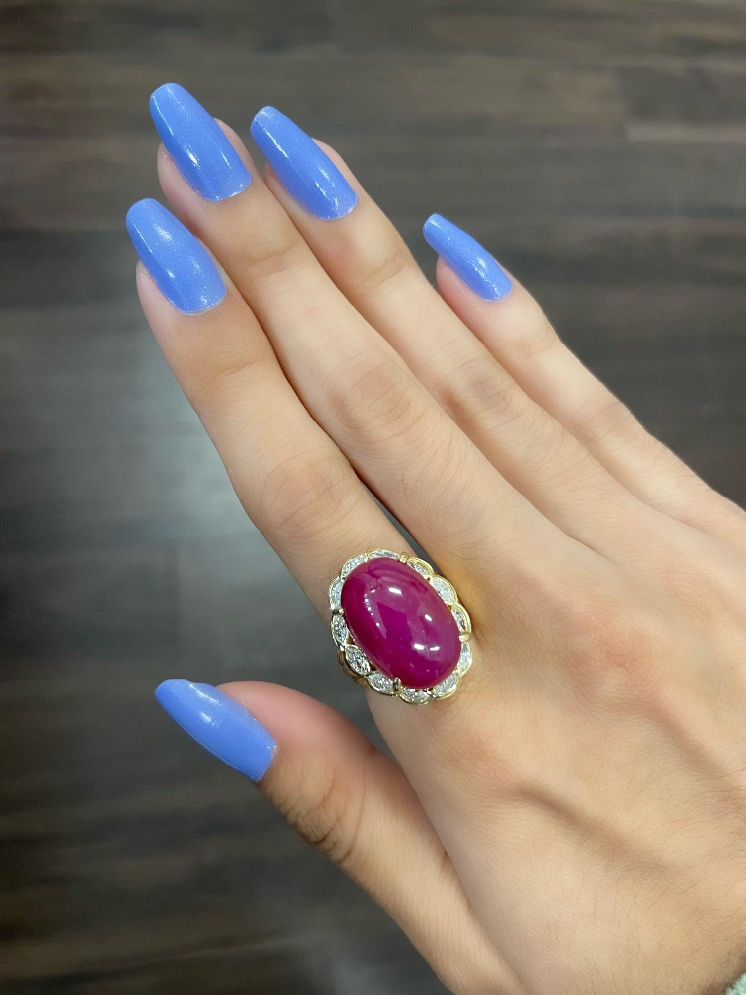 Absolutely stunning Cabochon Burma no heat ruby weighing 17.43 ct certified by GIA with marquise diamond ring .77 ct (weight stamped) set in 18k white gold. 