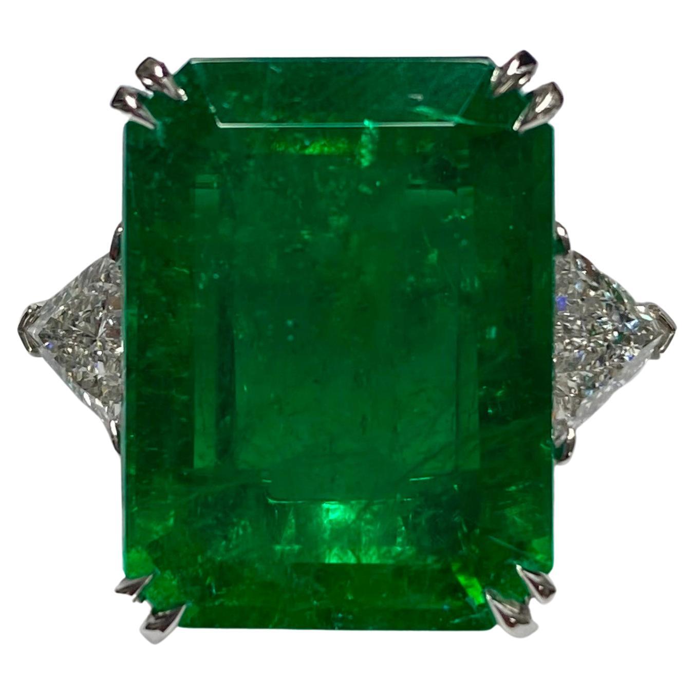 17.45 Carat Emerald Three Stone Ring, 1.40 Carat Trillion Diamonds, Platinum For Sale