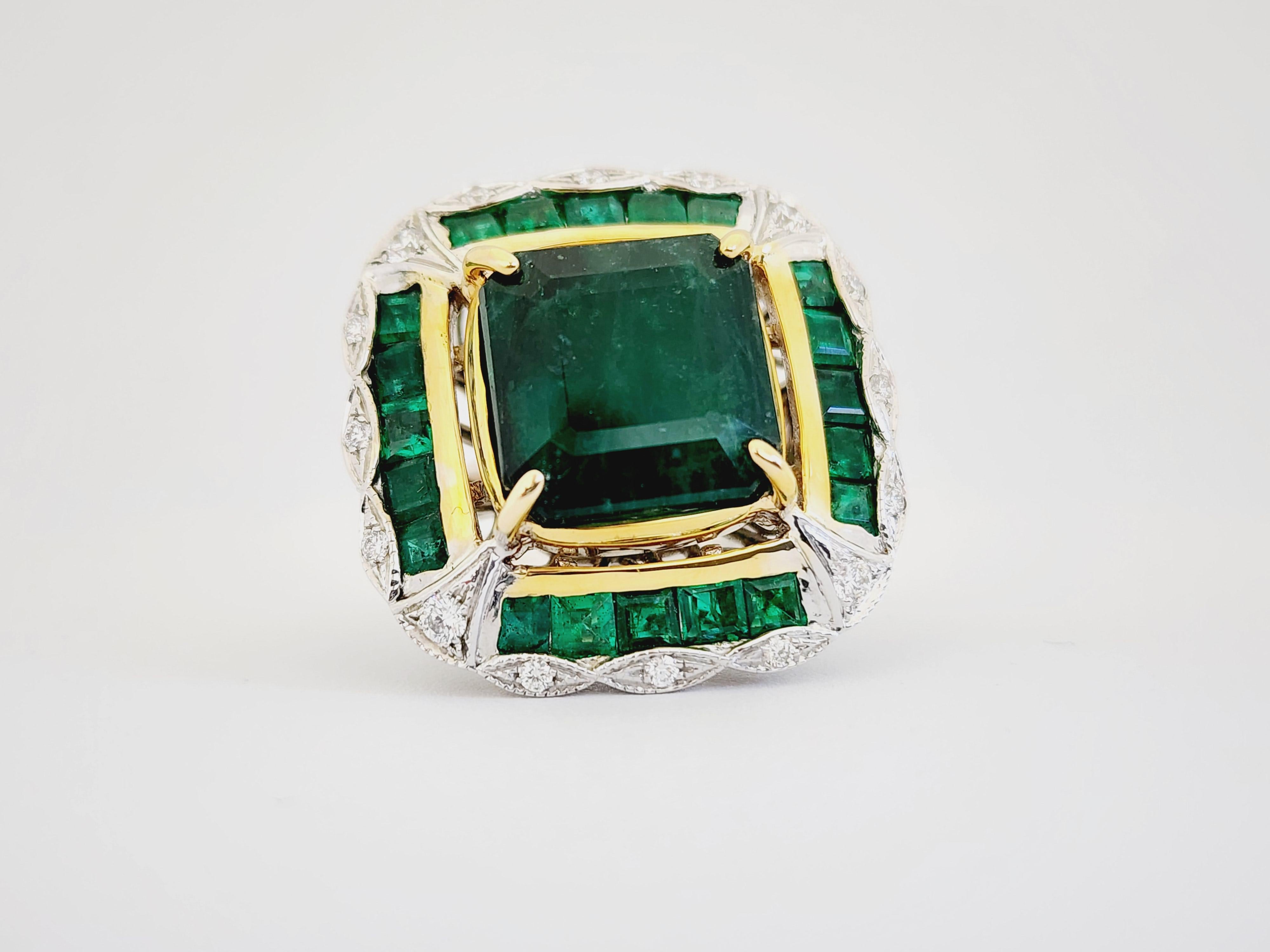 Magnificent Natural Emerald White Gold Diamond Ring 18 Karat, Transparent Vivid Green.

18 Karat Weißgold, schwere Goldfassung, Ringgröße 7.

12,71 Karat Zentraler Smaragd

4,75 Karat seitlicher Smaragd

0,65 Karat seitliche Diamanten