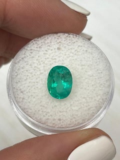 1.74ct 9x7 Freckled Bluish Green Colombian Emerald - Oval Cut May Birthstone