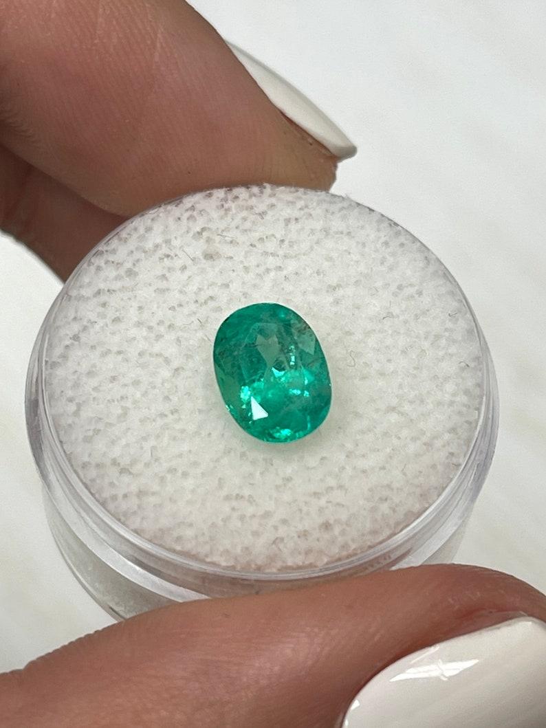 1.74ct 9x7 Freckled Bluish Green Kolumbianischer Smaragd im Ovalschliff Mai Geburtsstein im Angebot 1