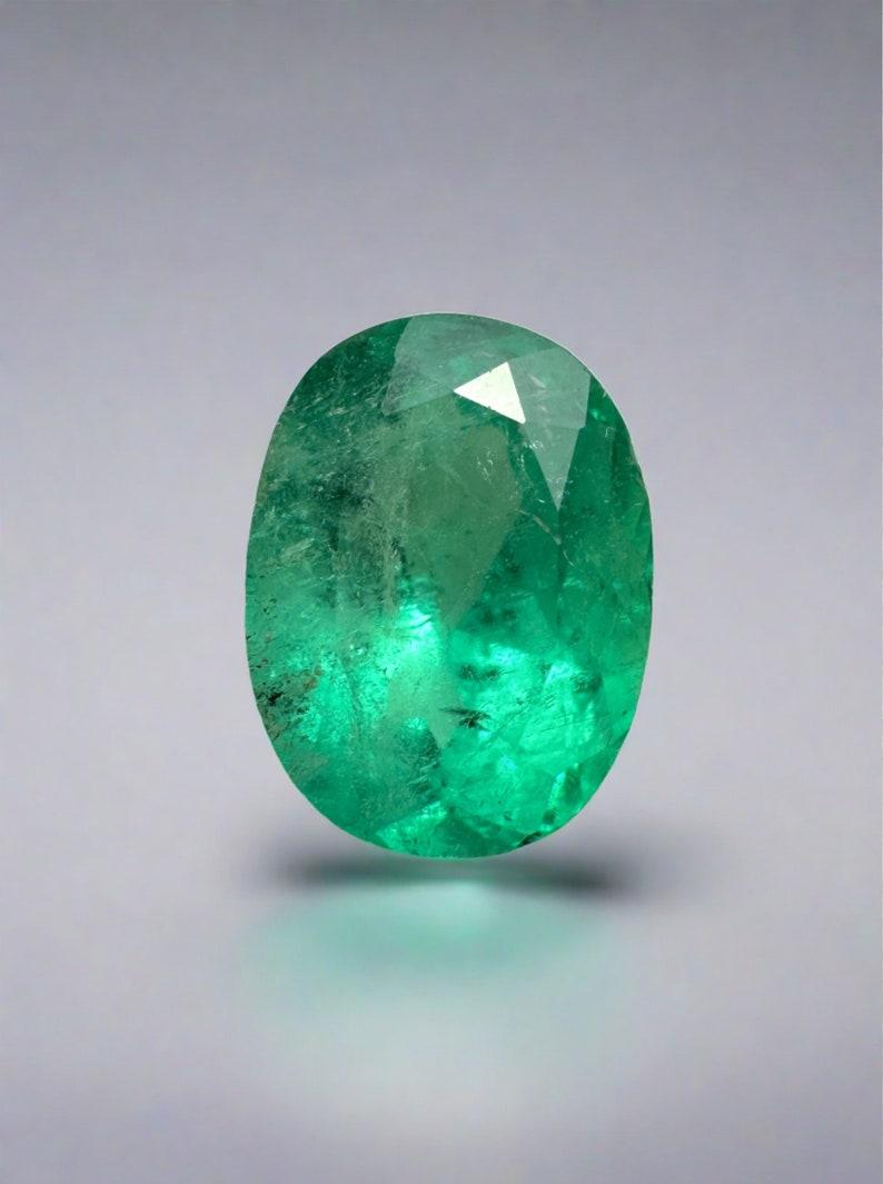 1,74 ct 9x7 Esmeralda colombiana verde azulada pecosa - Talla ovalada Birthstone de mayo