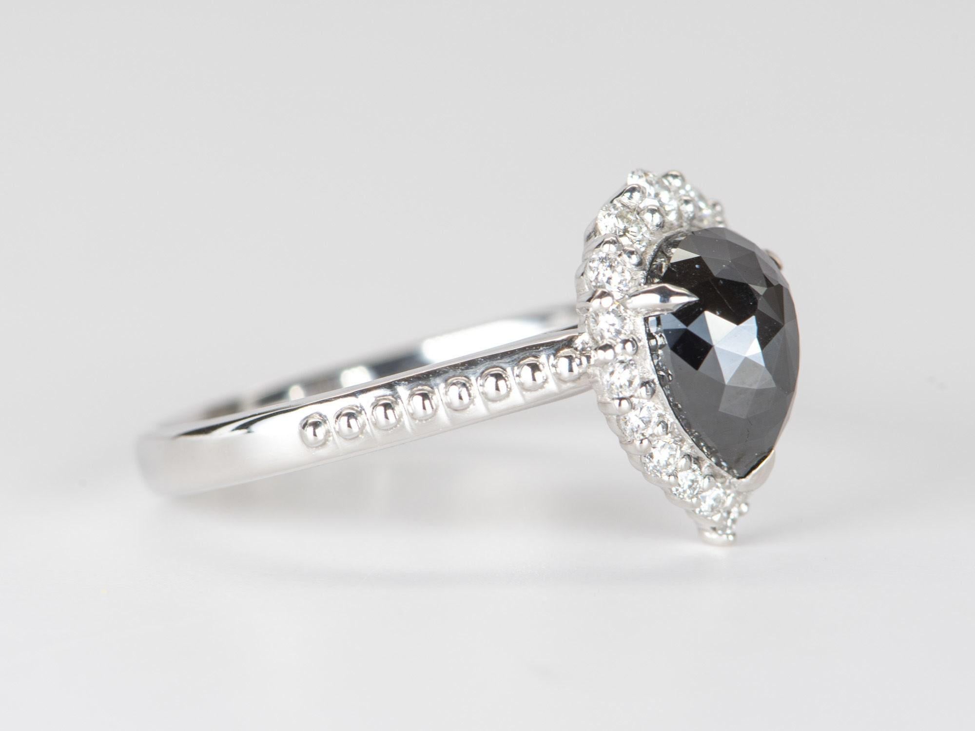 black and clear diamond engagement ring