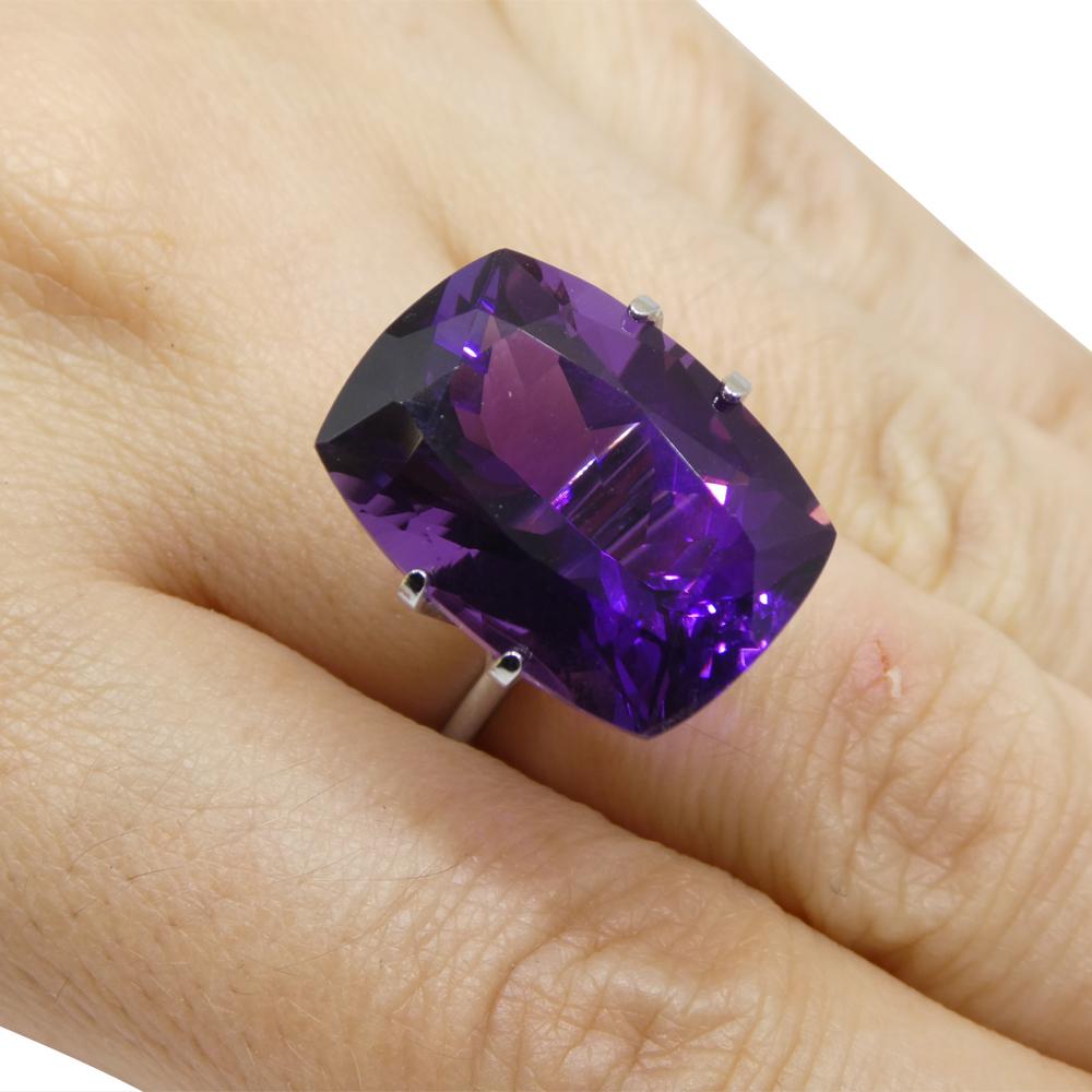 Description:

Gem Type: Amethyst
Number of Stones: 1
Weight: 17.4 cts
Measurements: 19.44 x 14.13 x 10.77 mm
Shape: Cushion
Cutting Style:
Cutting Style Crown: Brilliant Cut
Cutting Style Pavilion: Modified Brilliant Cut
Transparency:
