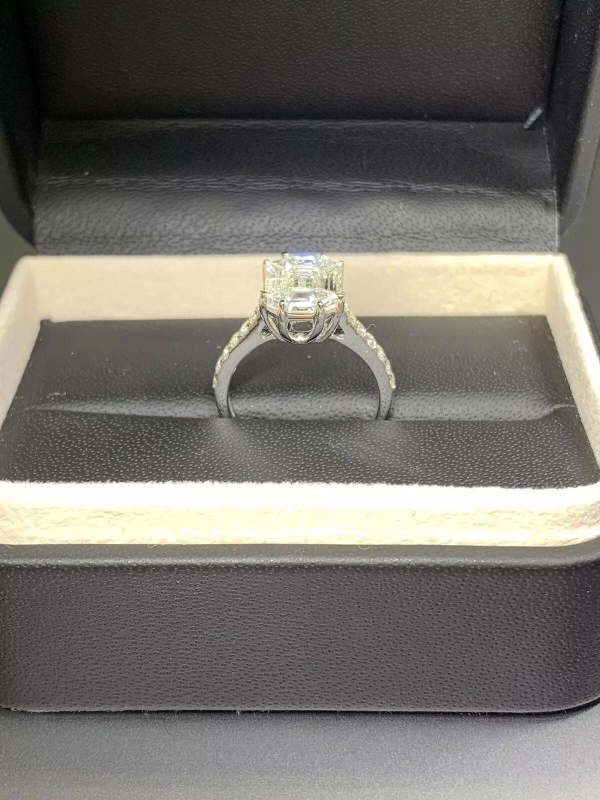 Baguette Cut 1.74ct Emerald diamond pave band engagement ring in 18k white gold. For Sale