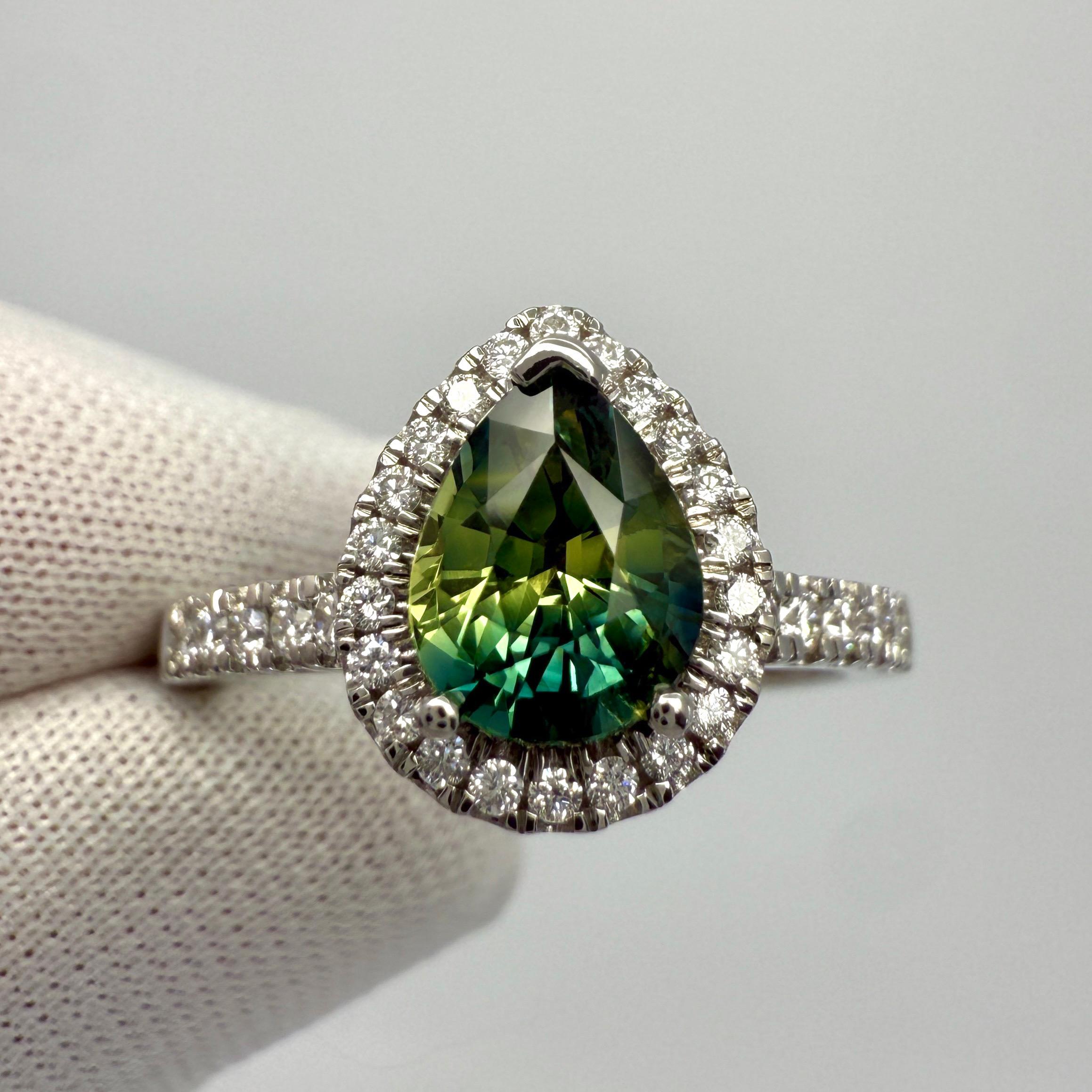 Taglio a goccia Anello aureolato in platino con zaffiro di colore parziale certificato GIA da 1,74 ct. in vendita