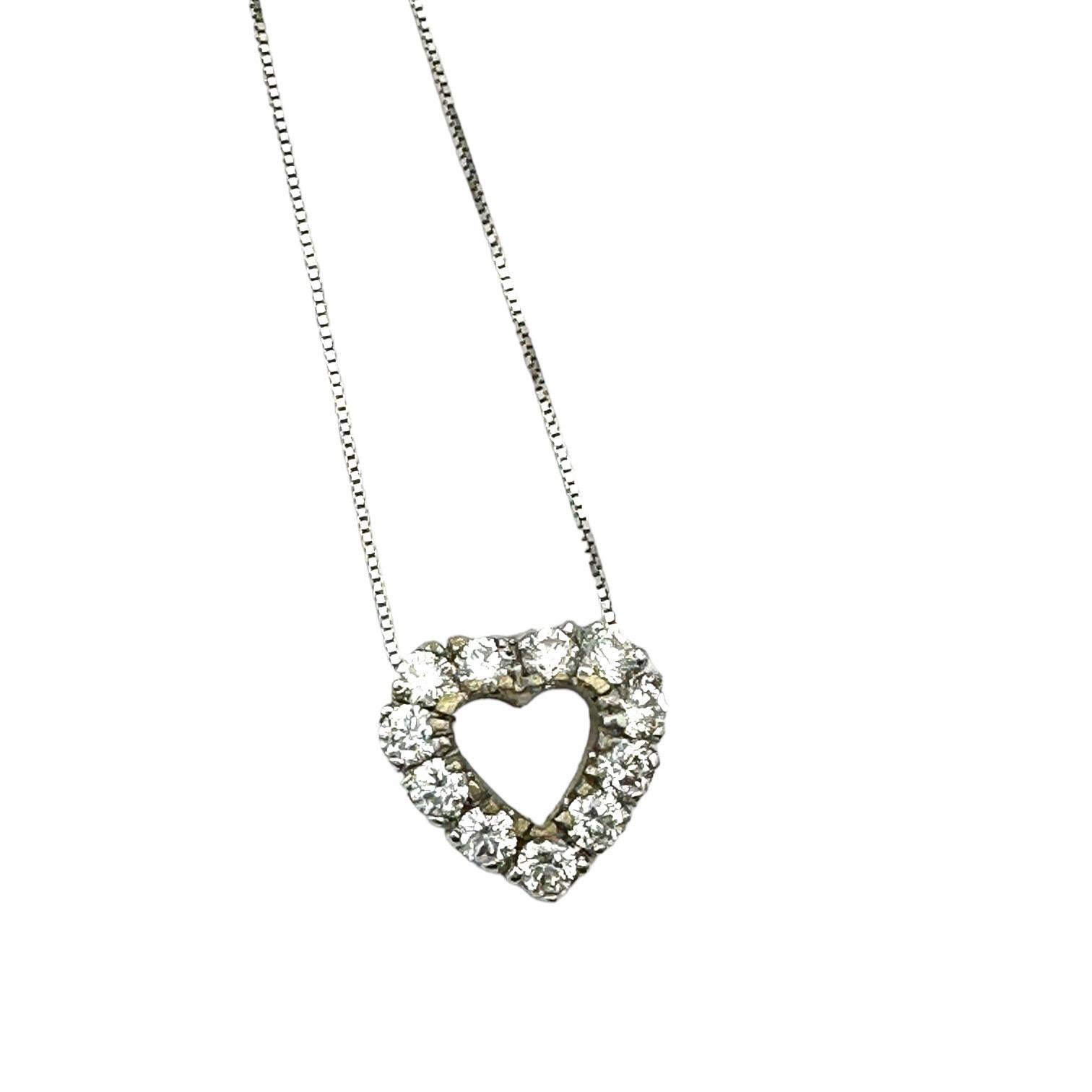 This stunning 1.75 Carat Diamond Heart Pendant and chain is crafted with 18K white gold and quality diamonds set in prong settings. The diamonds have an impressive VS-F/G grade, ensuring their remarkable sparkle and brilliance. A timeless symbol of