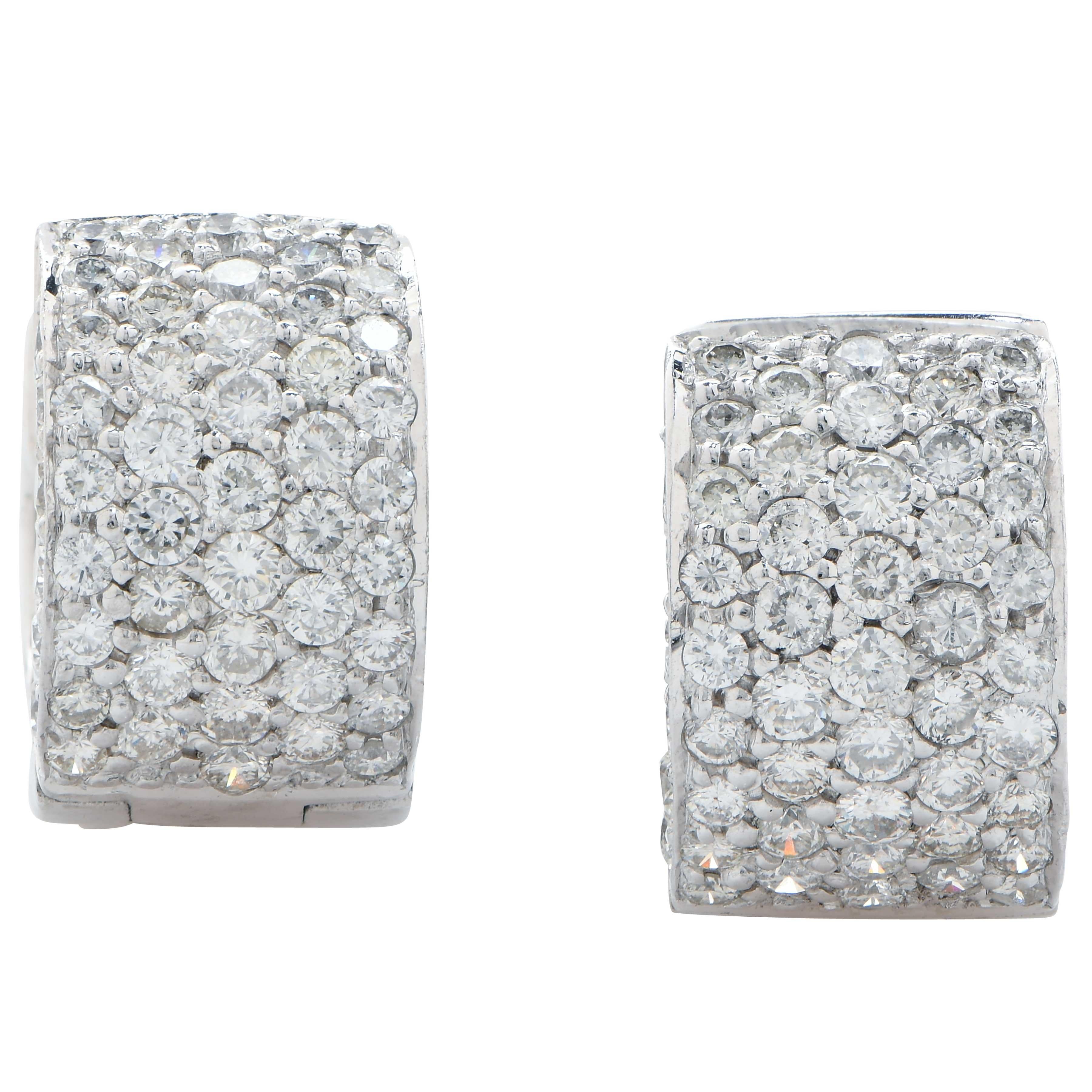 Designed in 18 karat white gold, ensuring durability and a timeless appeal, these lovely diamond earrings are quite beautiful.

The centerpiece of these earrings is the dazzling display of diamonds. A total of 86 diamonds, collectively weighing