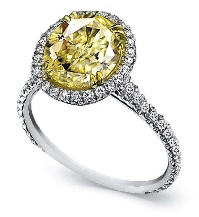 Modern 1.75 Carat Fancy Yellow Halo Diamond Engagement Ring For Sale