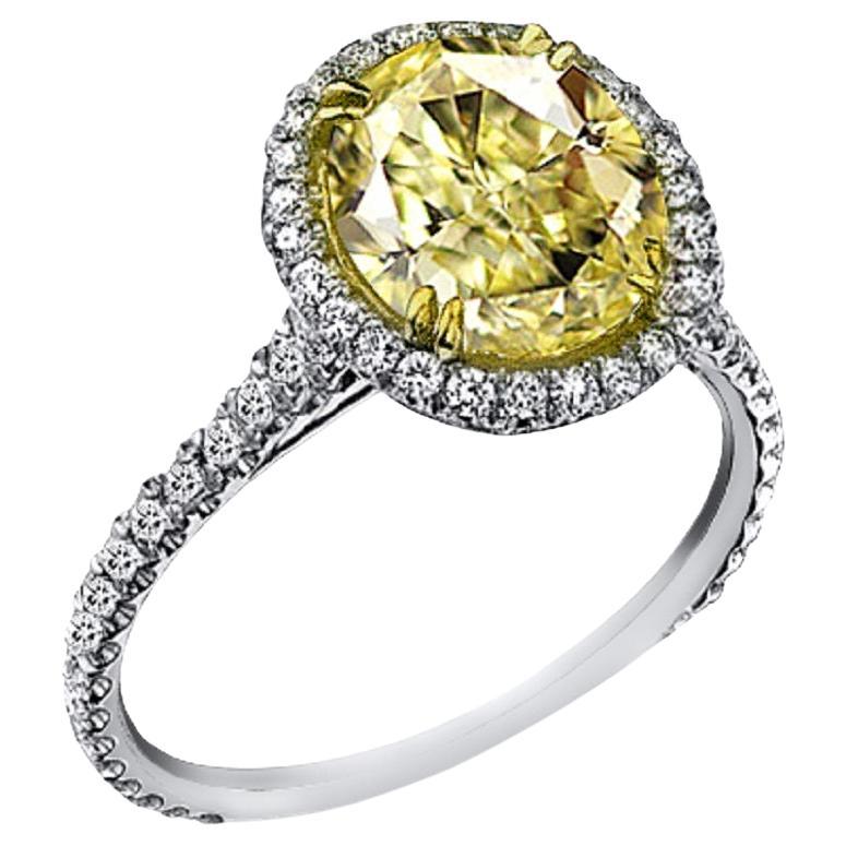 1.75 Carat Fancy Yellow Halo Diamond Engagement Ring For Sale