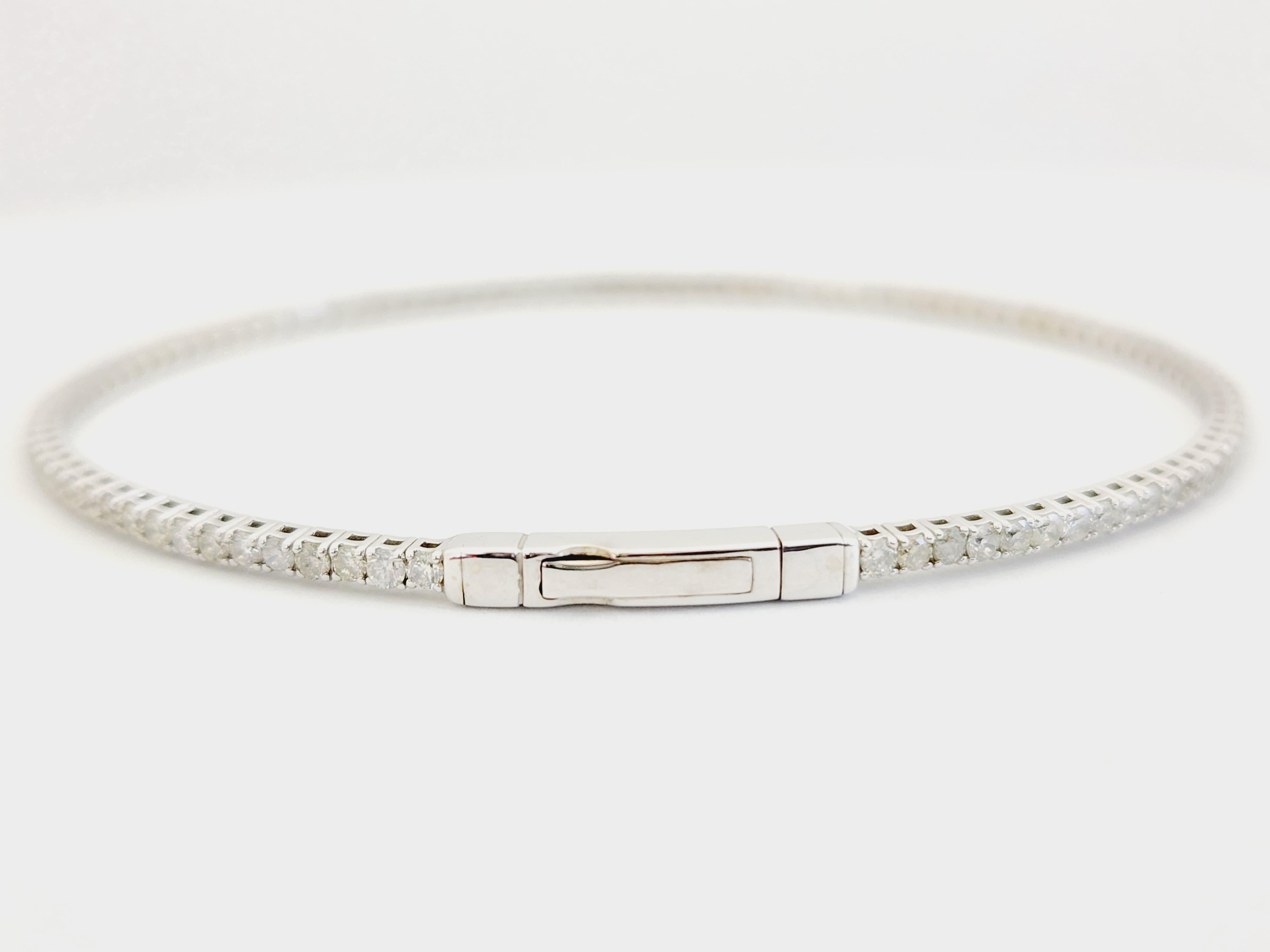 Natural Diamonds 1.75 ctw flexible full bangle white gold 14k 7 Inch. Average Color I Clarity SI, 1.7 mm wide.