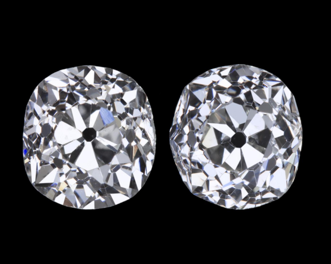 Something extraordinary a pair of G H Color 

This gorgeous and rare 2 carat antique matched pair of old mine cut diamonds is bright white, eye clean, full of old world charm, and dazzling with phenomenal sparkle! Cut by hand over a century in the