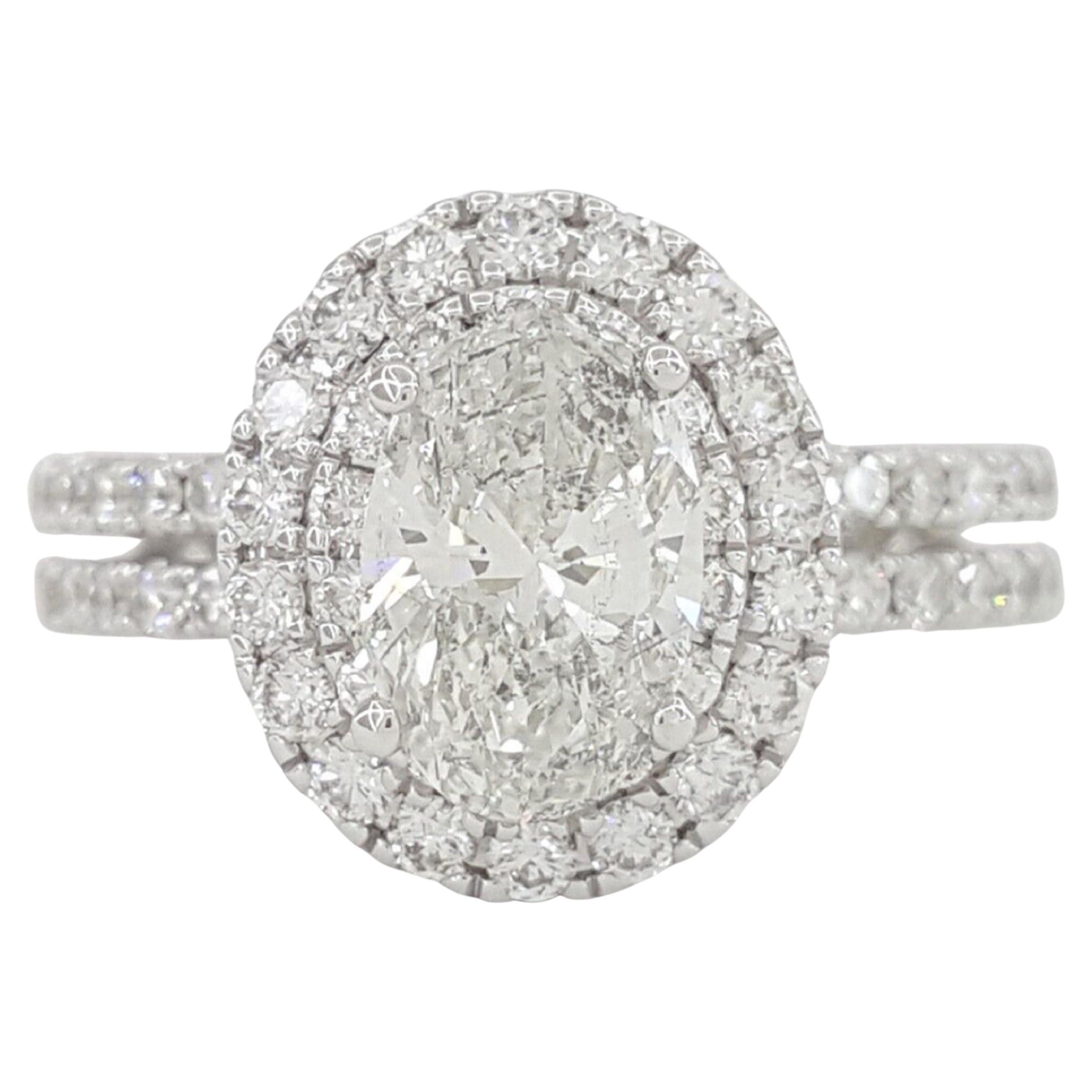 1.75 Carat Oval Cut Diamond Halo Engagement Ring For Sale