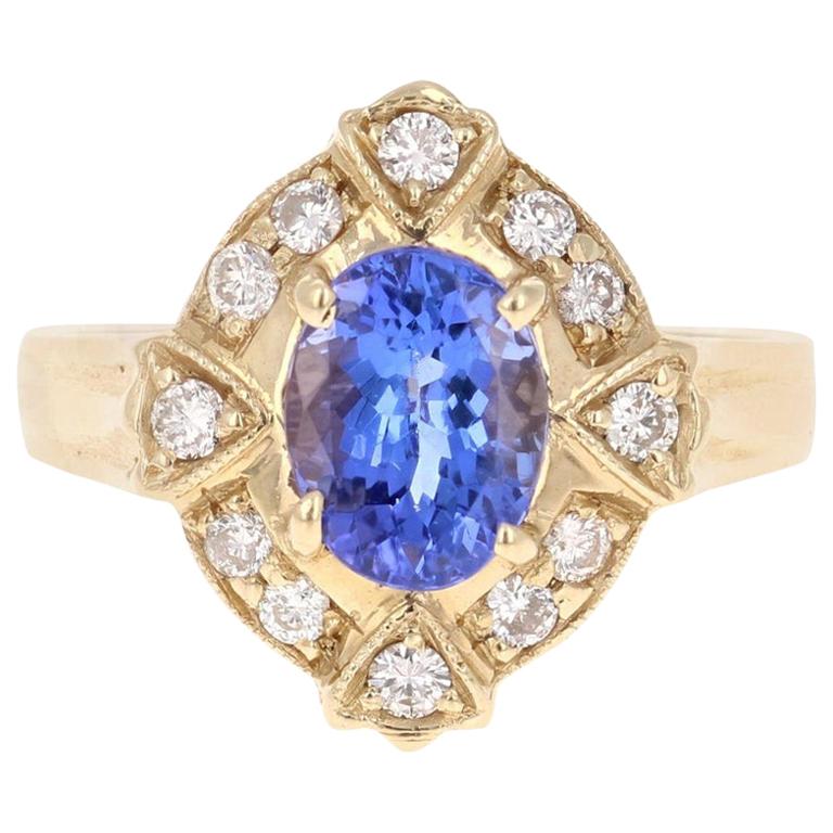 1.75 Carat Oval Cut Tanzanite Diamond 14 Karat Yellow Gold Ring For Sale