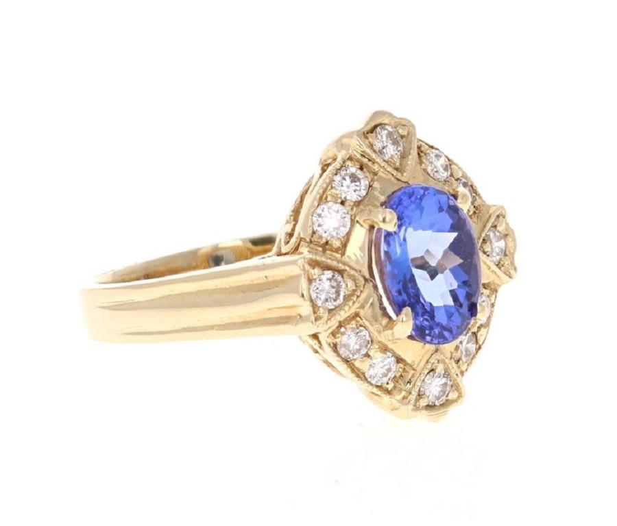 This simple everyday ring can be a promise or friendship ring! 

It has an Oval Cut Tanzanite that weighs 1.35 carats and is adorned with 12 Round Cut Diamonds that weigh 0.40 carats.

It is set in 14 Karat Yellow Gold and weighs approximately 4.7