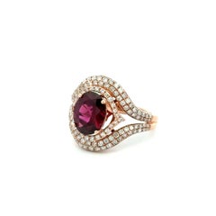 1.75 Carat Oval Garnet and Diamond Double Halo Vintage Gold Ring