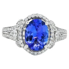 1,75 Karat Oval Tansanit und Diamant Halo Ring in 14K Weißgold Größe 7