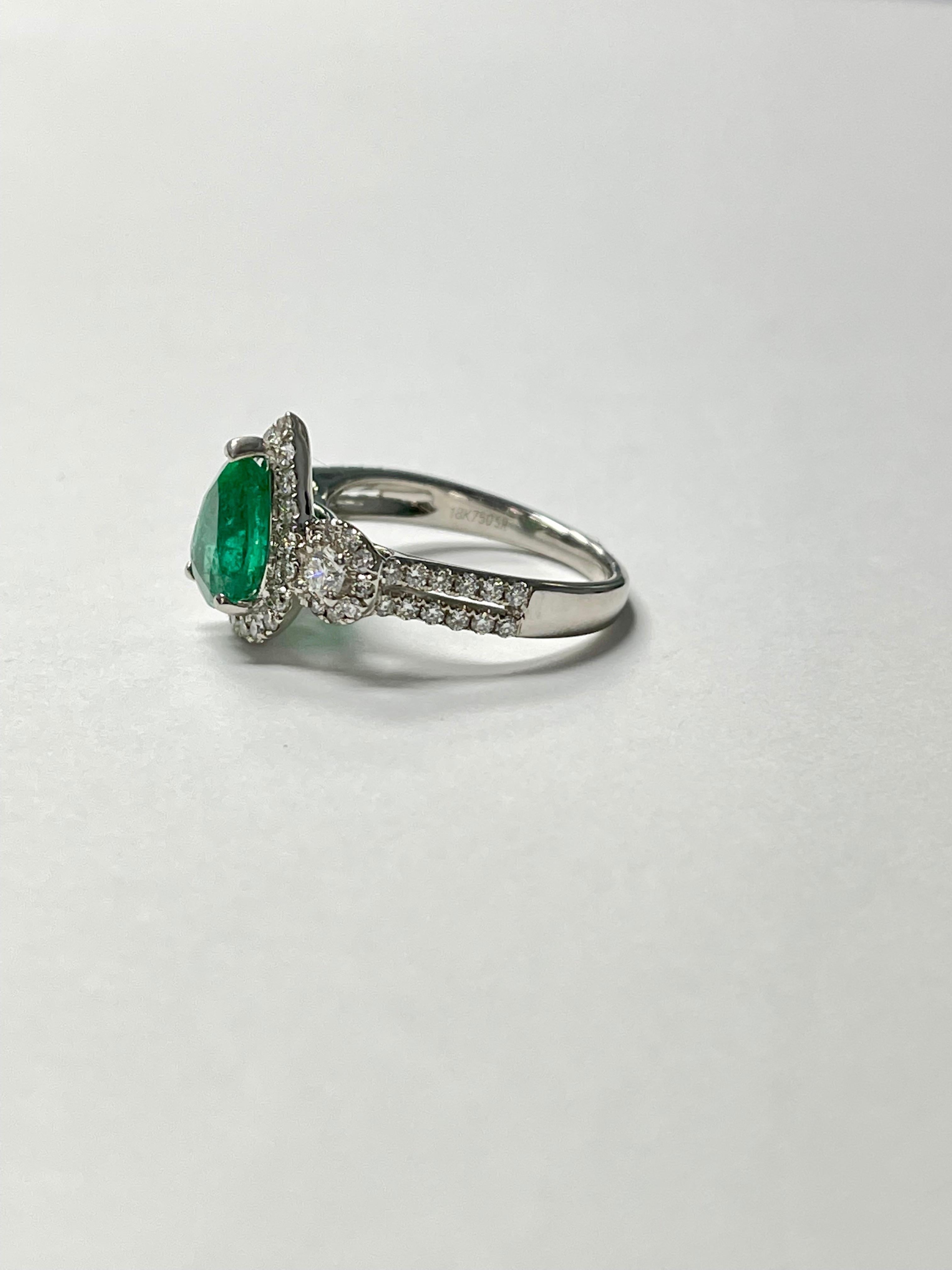 Women's or Men's 1.75 Carat Pear Shape Emerald and Diamond Ring in 18K White Gold For Sale