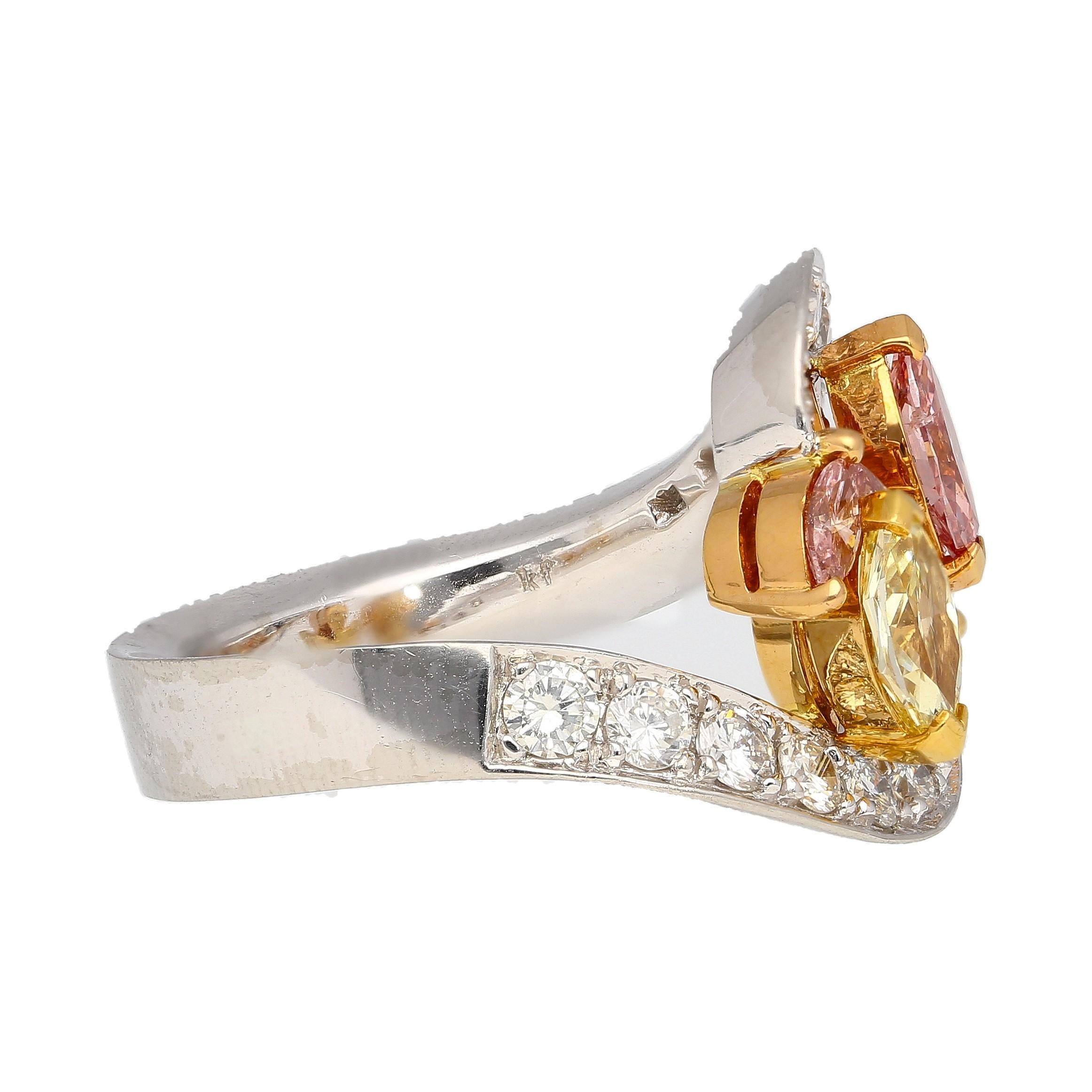 1.75 Carat Fancy Pink and Yellow Marquise Cut and Round Brilliant Cut Diamond in Platinum and 18K Yellow Gold Bypass Ring.

Details: 
Item Type: Multi Stone Bypass Ring
Metal: Platinum and 18K Yellow Gold
Size: 6 (adjustable)
Weight: 10.18