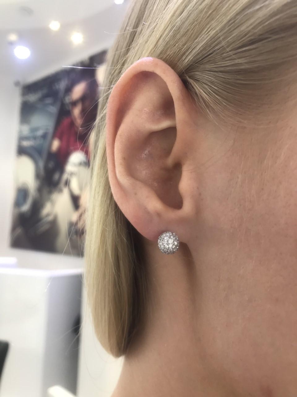 These Beautiful 1.75 Carat Diamond Stud Earrings White Color F Clarity VVS1 are surrounded in Round Brilliant Cut Diamonds hand set to perfection in 18 Karat White Gold. These elegant Diamond Stud earrings are simply magnificent and perfect for any