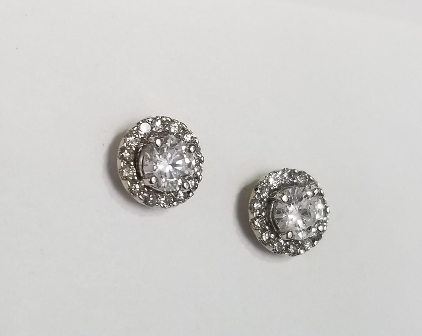 14k white gold 1.23ct.s diamonds stud earrings, containing 2 brilliant cut diamonds; color 