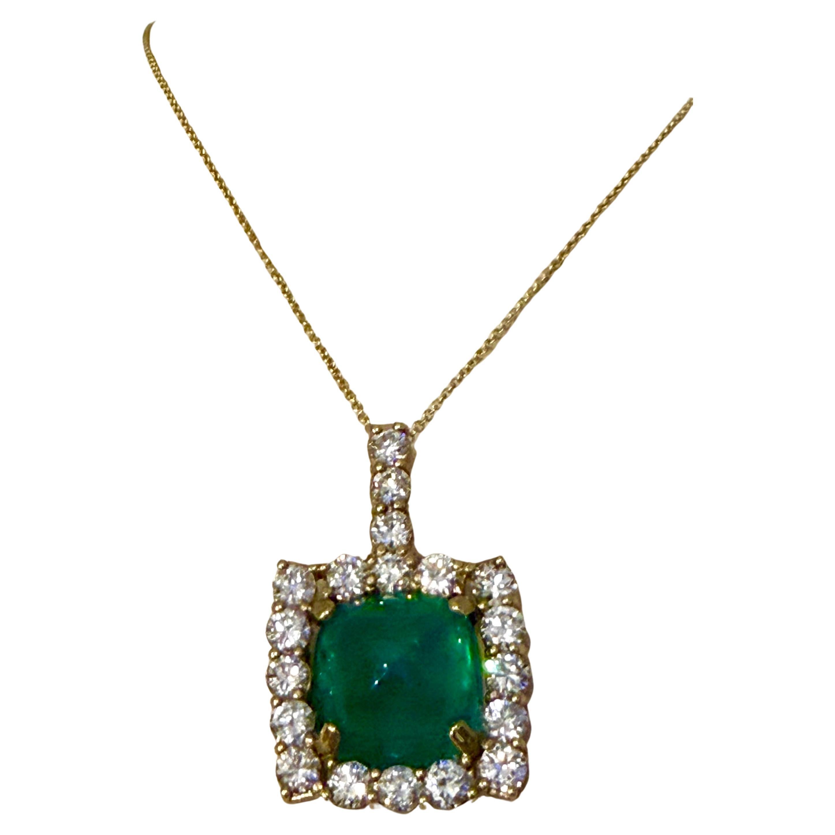 17.5 Ct Sugar Loaf Cabochon Colombian Emerald
5.7 Ct Diamond Necklace 14KYG