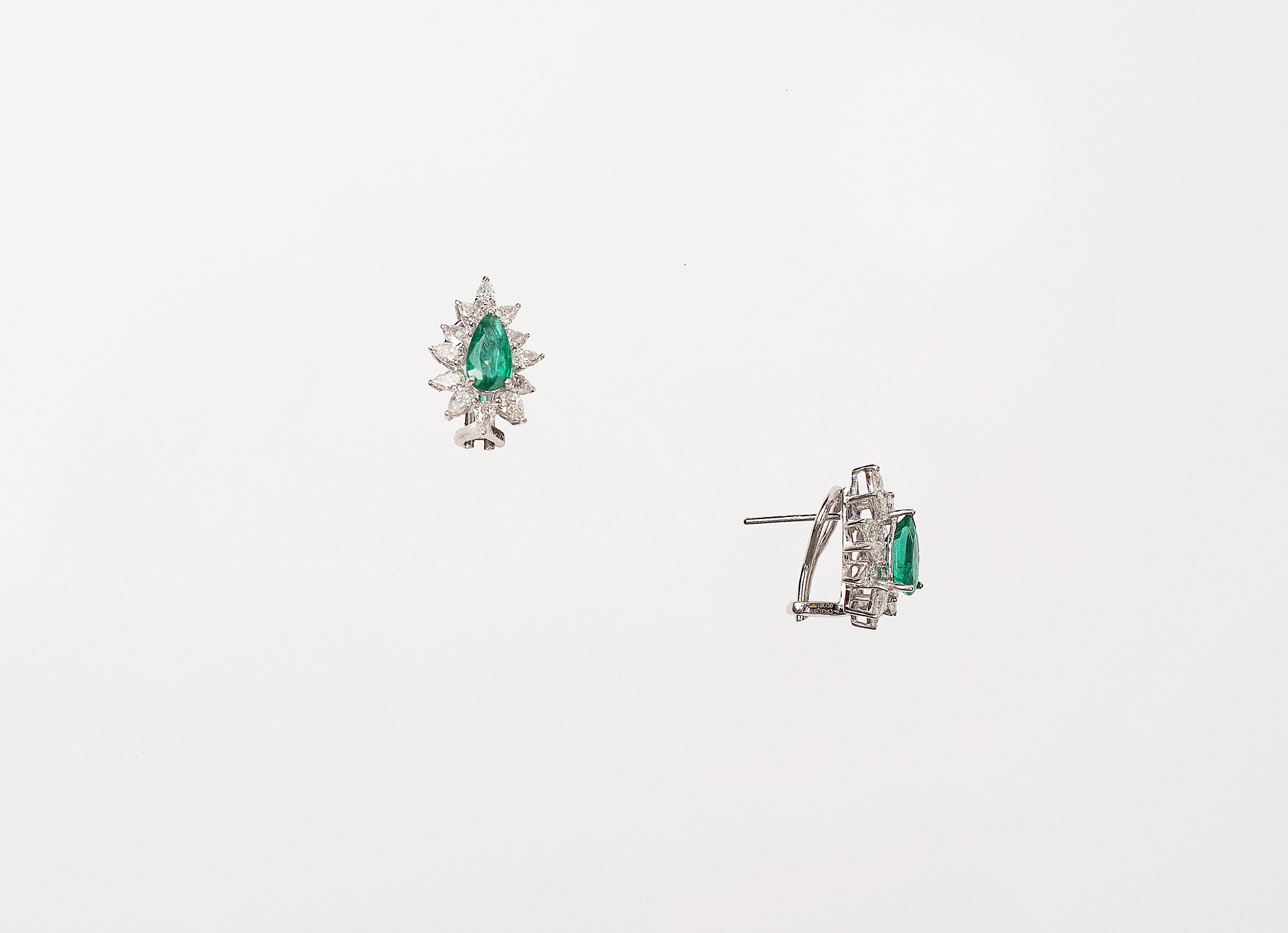 Modern 1.75 Cts Diamonds and 1.74 Cts Natural Emerald Stud Earring in 18K Gold For Sale