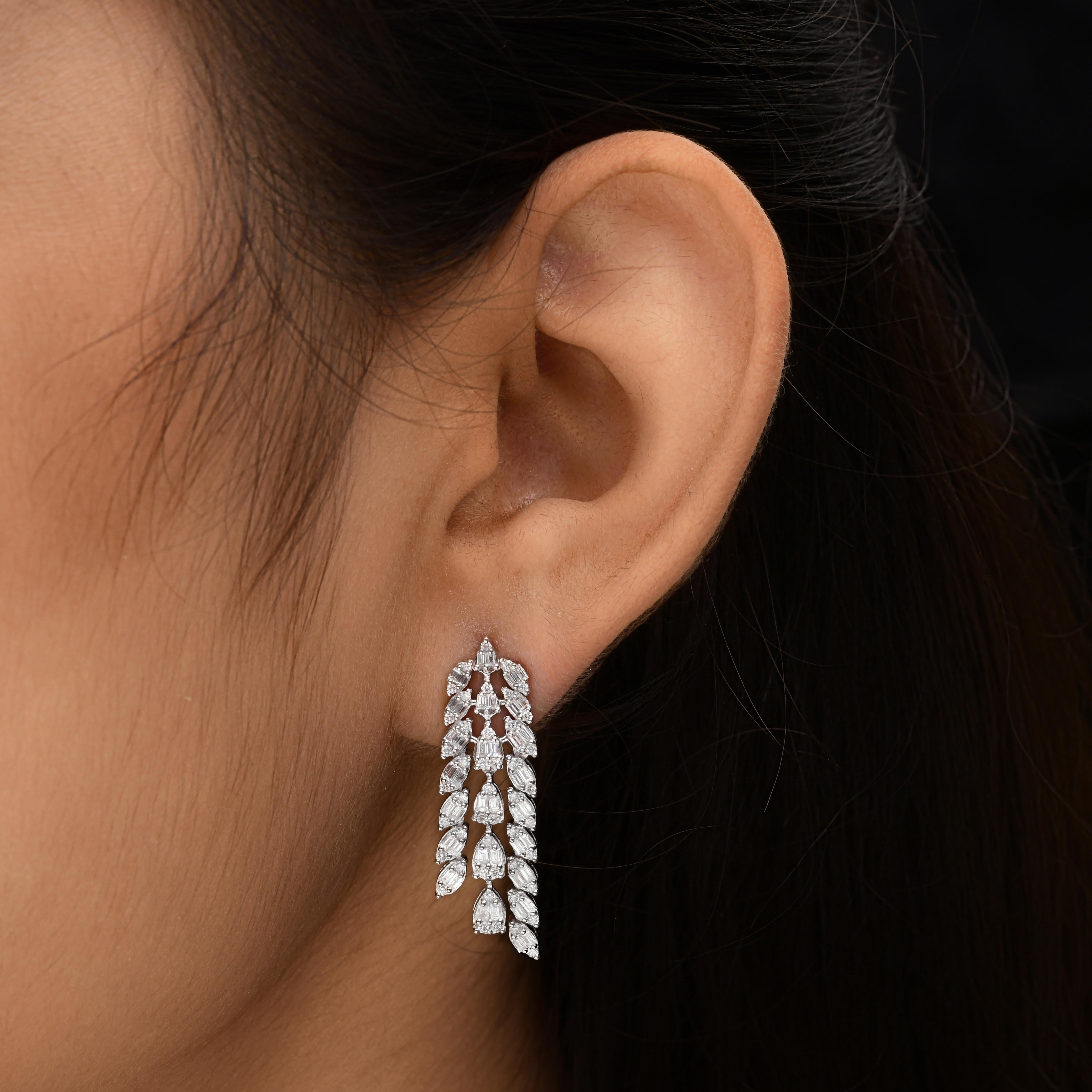 Coulées dans de l'or 14 carats, ces boucles d'oreilles exquises sont serties de 1,75 carats de diamants étincelants.

Suivez la vitrine de Spectrum Jewels pour découvrir la dernière collection et les pièces exclusives. Spectrum Jewels est fièrement
