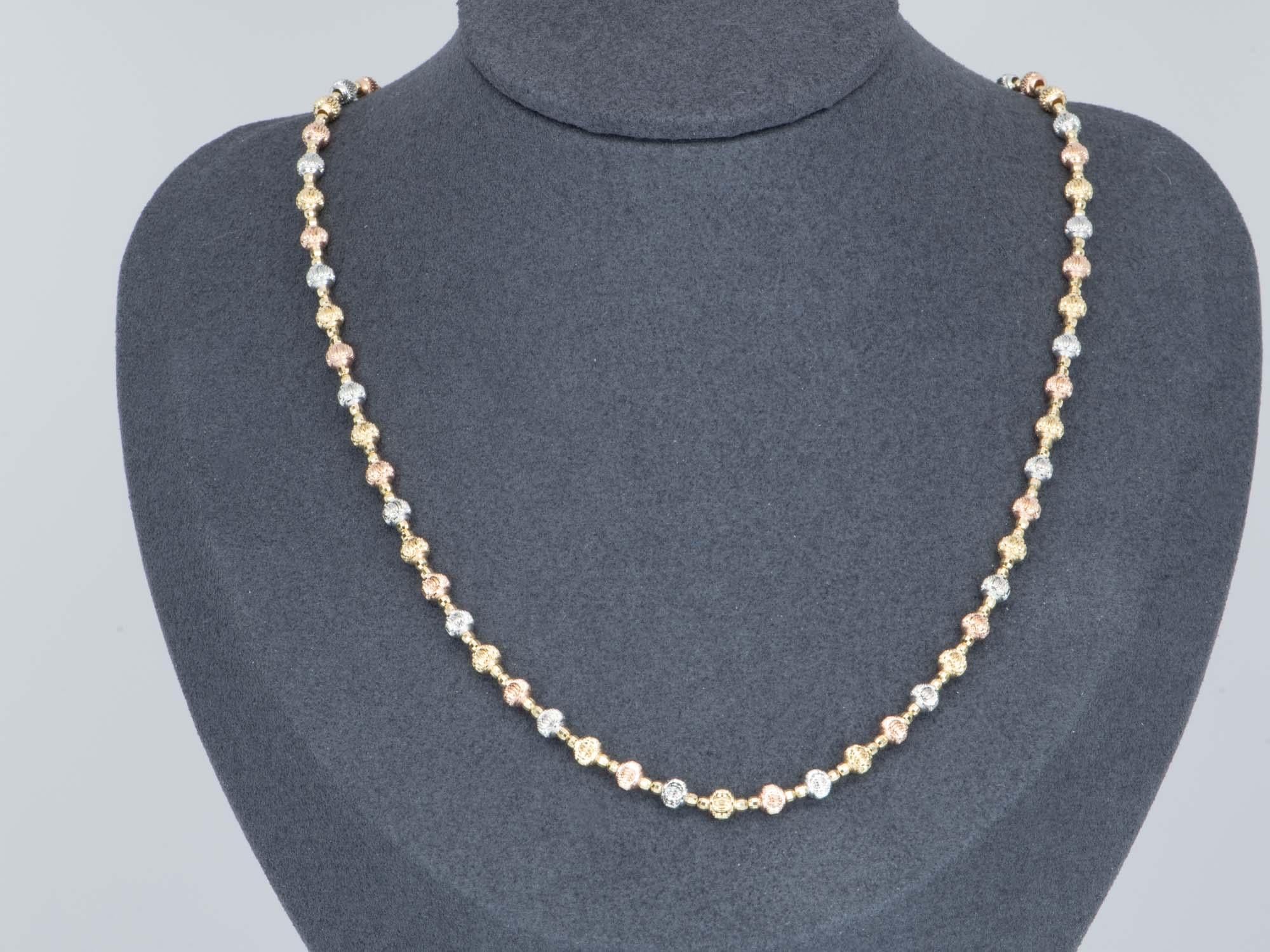   Adorn yourself with this stunning 18K gold necklace! Crafted with sparkling diamond cut beads ranging in three glistening gold colors, this 11g+ necklace is sure to draw all eyes. Embrace your elegance and sparkle on with this gorgeous piece!

♥