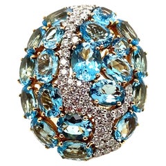 17.50 Carat Natural Oval-Cut Blue Topaz and White Diamond Pink Gold Ring