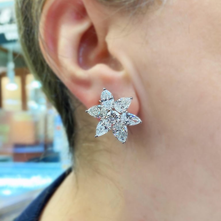 17.50 Carat Pear Marquise Round Cut Diamond Platinum Cluster Stud Earrings

These state of the art feature round diamonds in the center surrounded by marquise and pear shape diamonds.

17.50 carat E-F color, VS1-SI1 clarity diamonds total