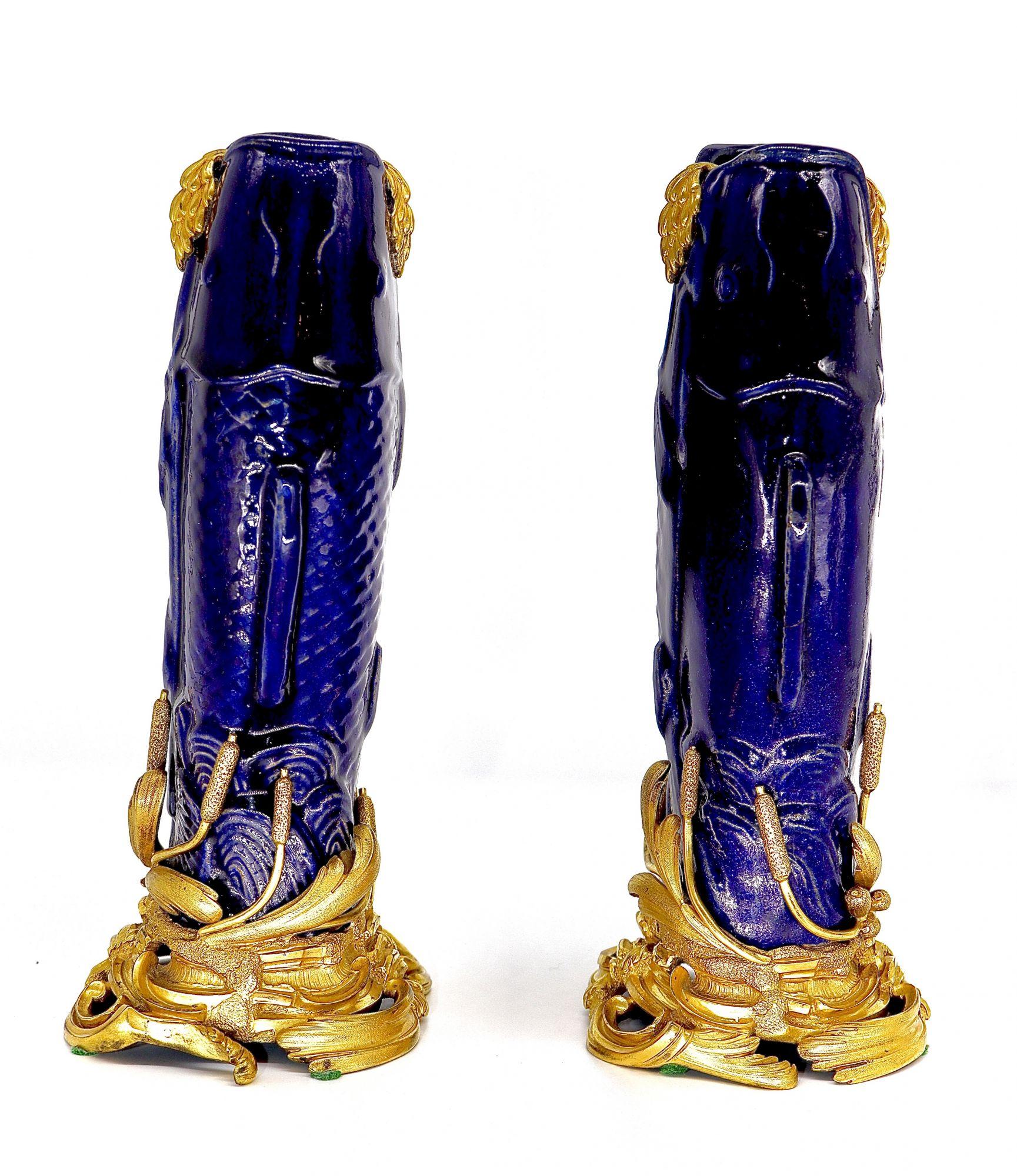 Carved 1750 Circa, a Pair of Mounted Porcelain Karp Shaped Vases For Sale