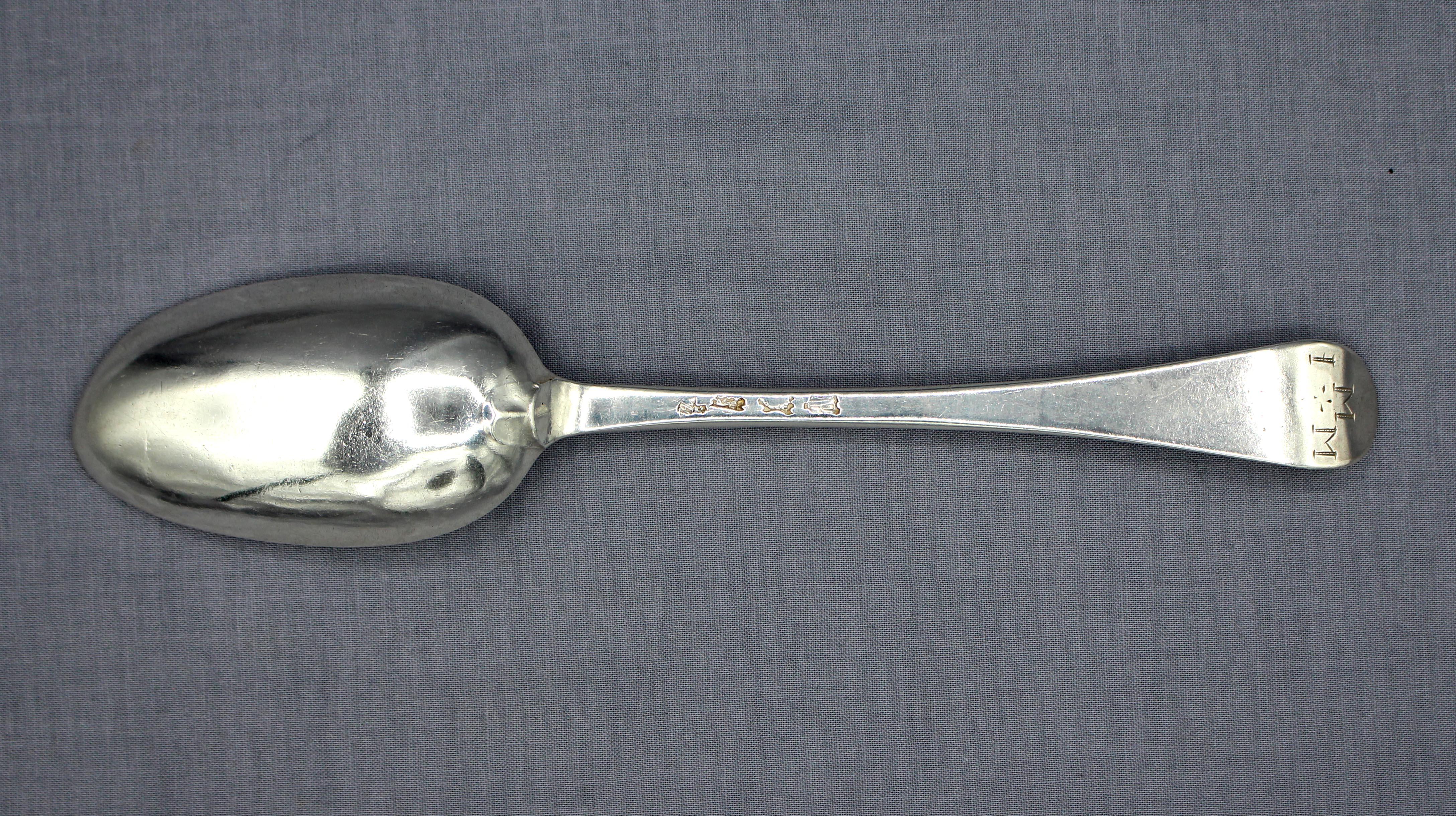 1750 Hanoverian pattern sterling silver tablespoon by Marmaduke Daintrey, London. The crown in mark likely due to his location at The Crown, Old Street. George II period. A substantial, well used spoon. Monogram obverse 