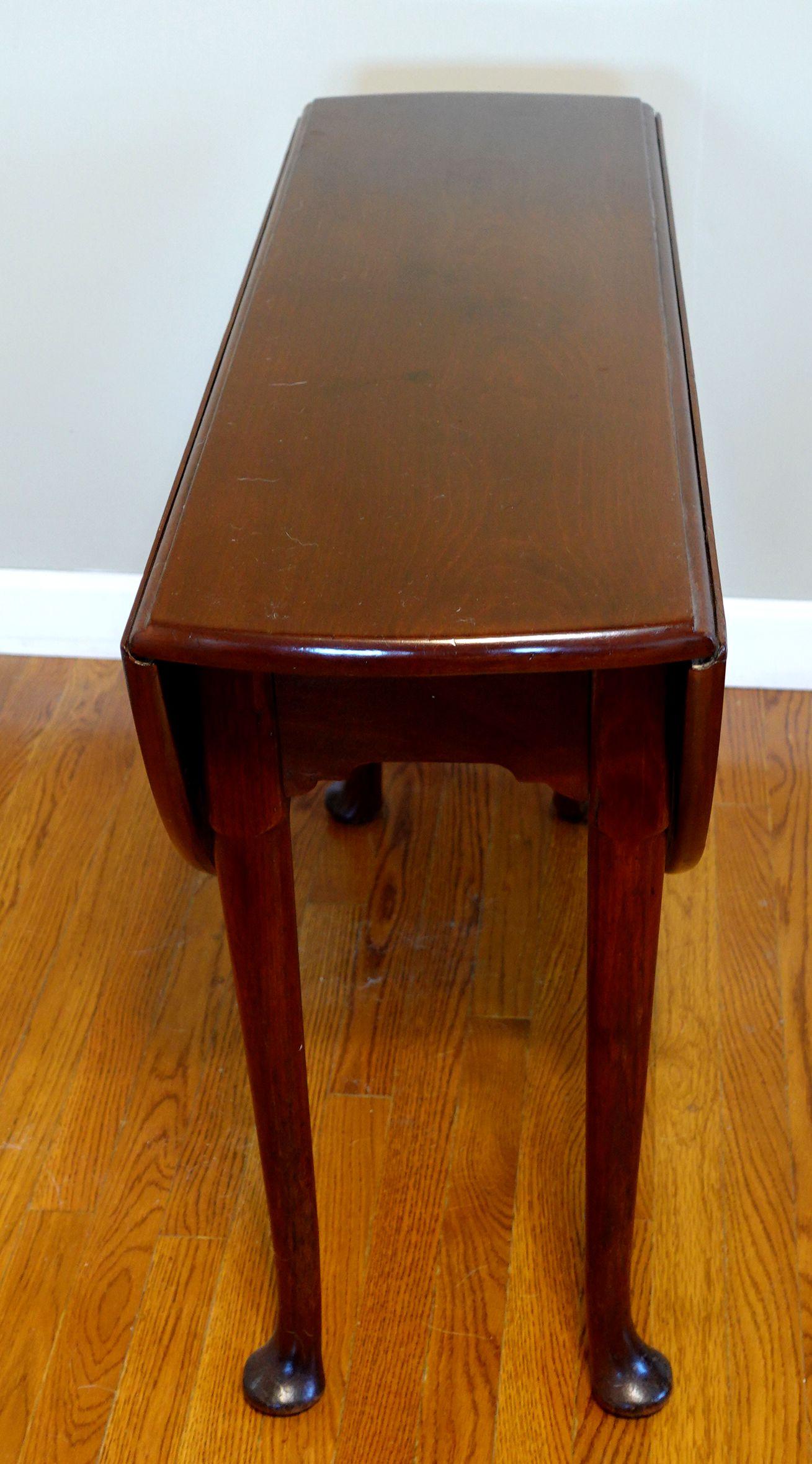 Hand-Carved 1750 Queen Anne Table with Oval Drop Leaves on Turned Legs For Sale